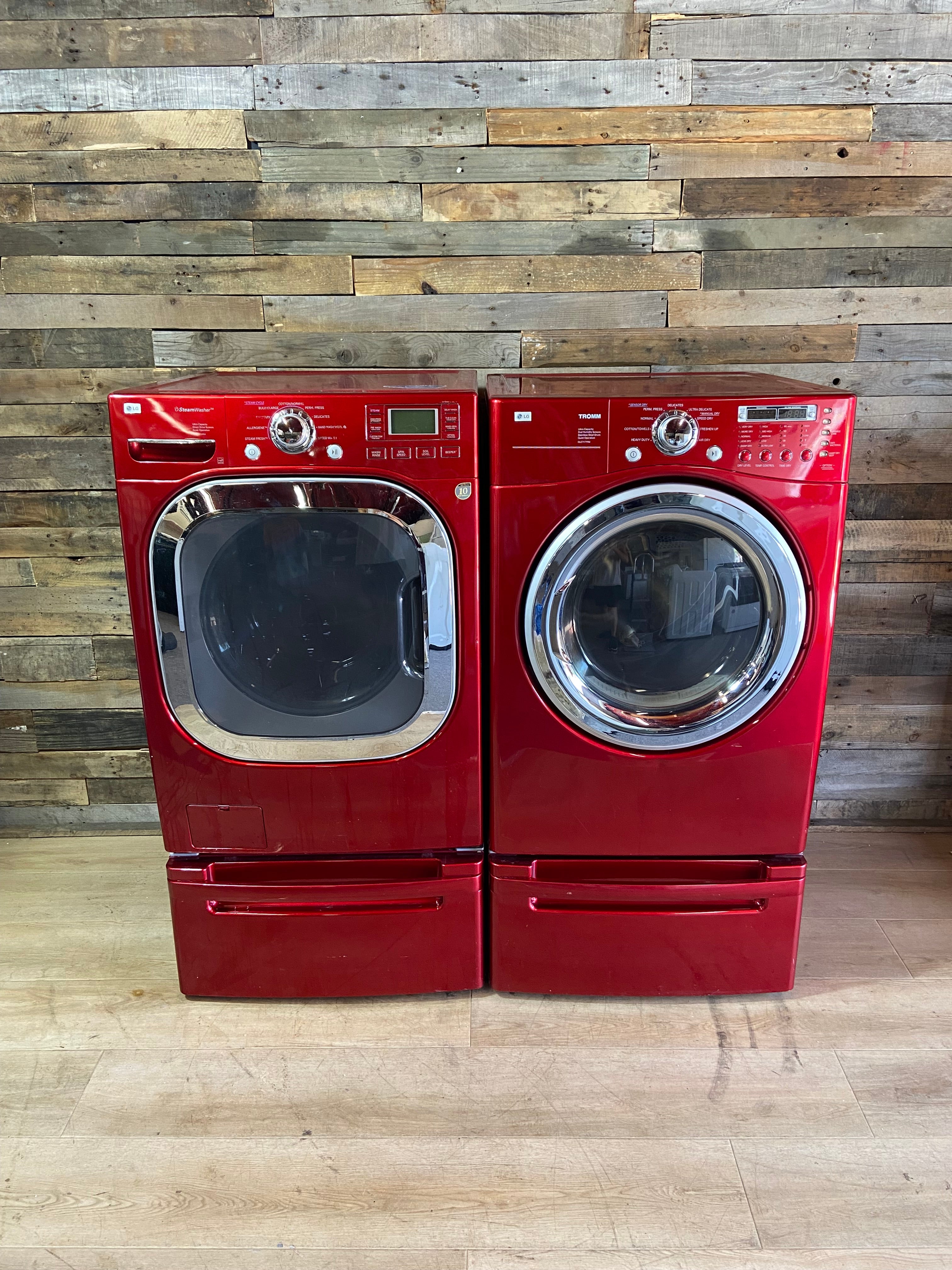 Red LG Front Load Washer & Dryer Set With Pedestals