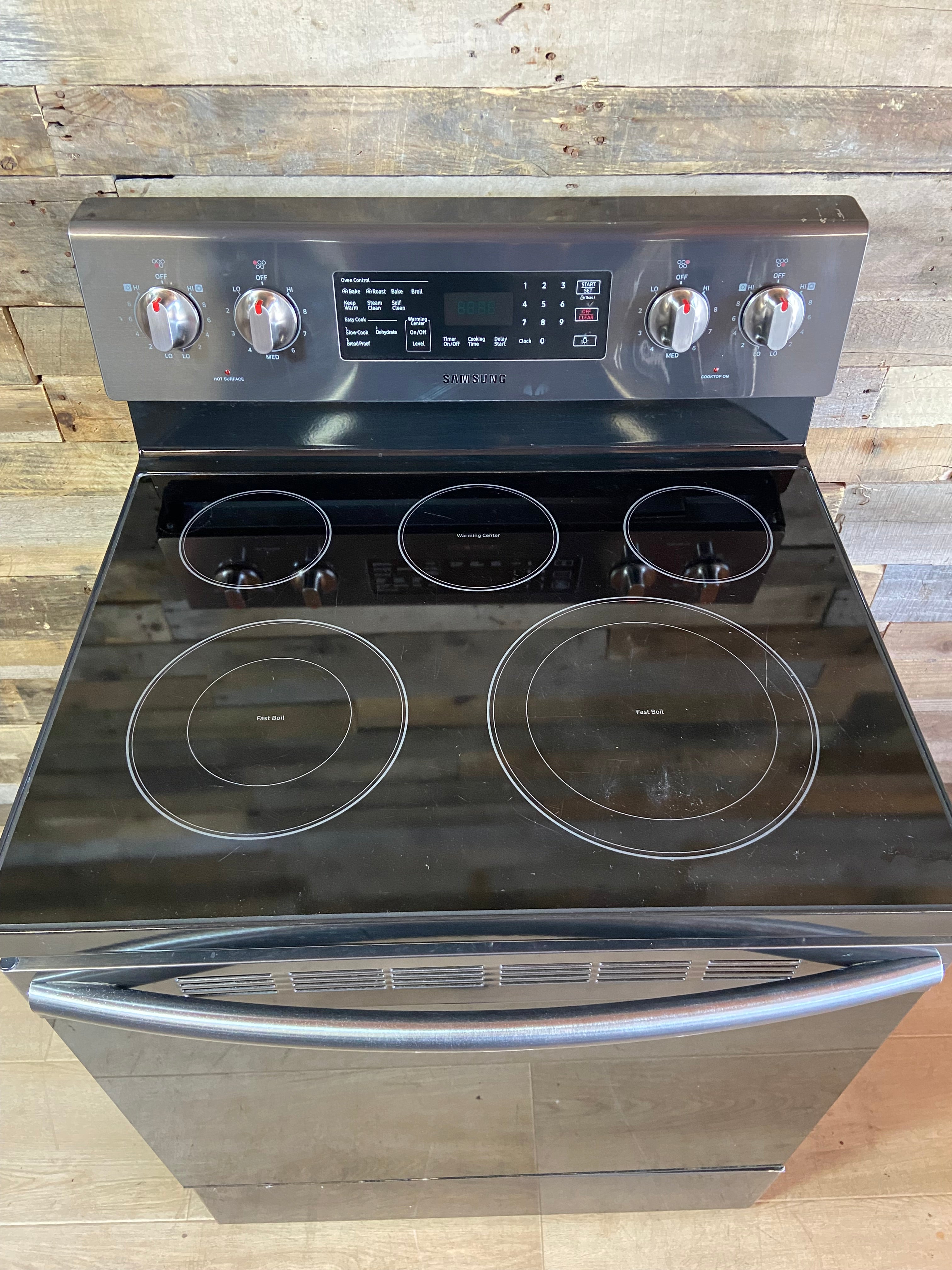 Samsung Black Stainless 5 Burner Range With Convection