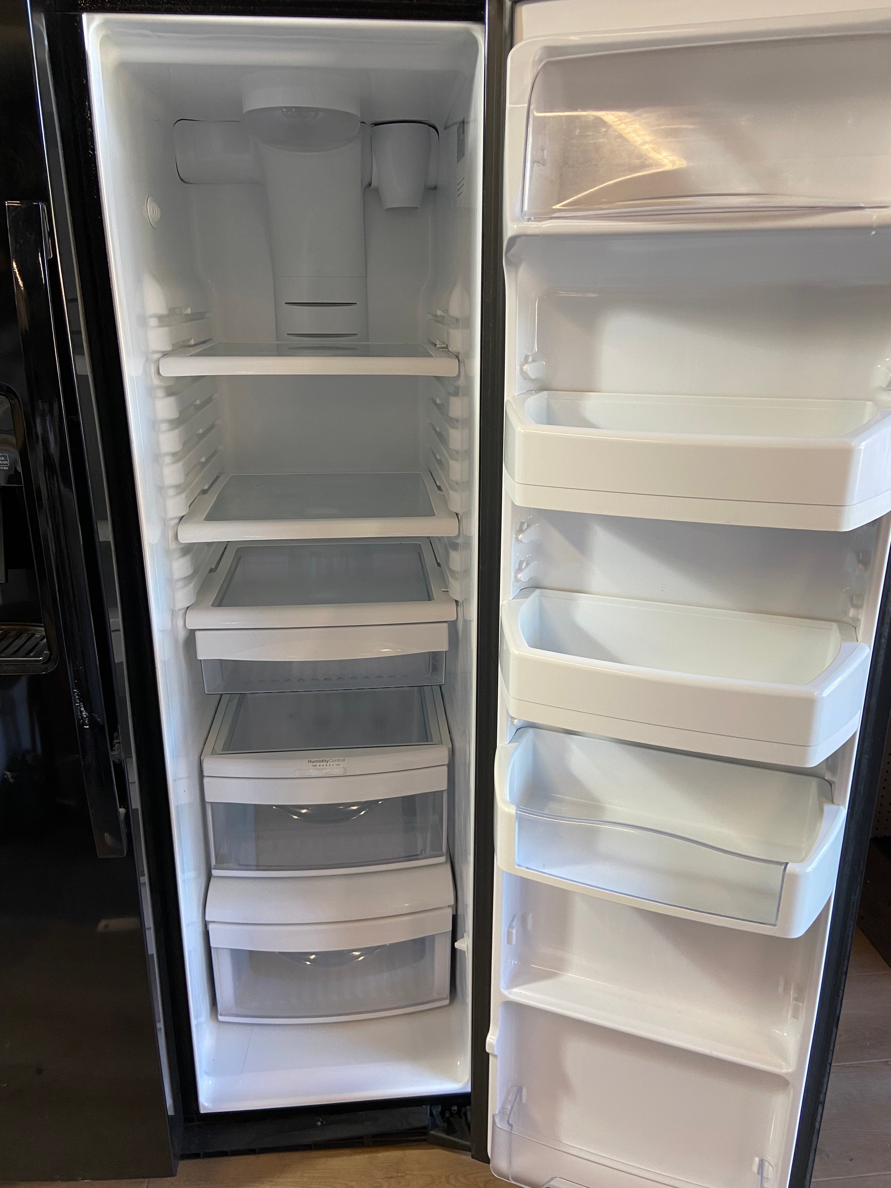 Black Side/Side GE Refrigerator. Ice/Water doesn’t work