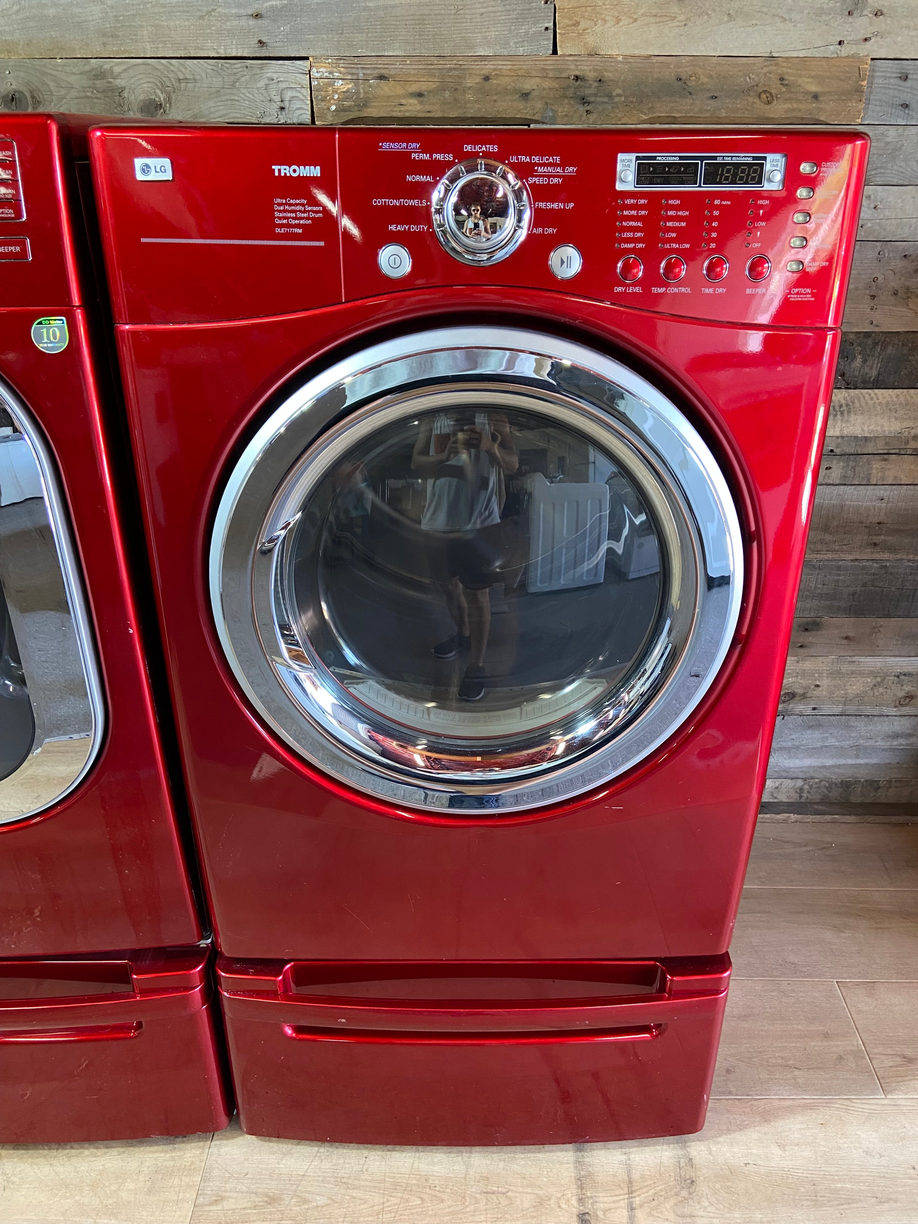 Red LG Front Load Washer & Dryer Set With Pedestals