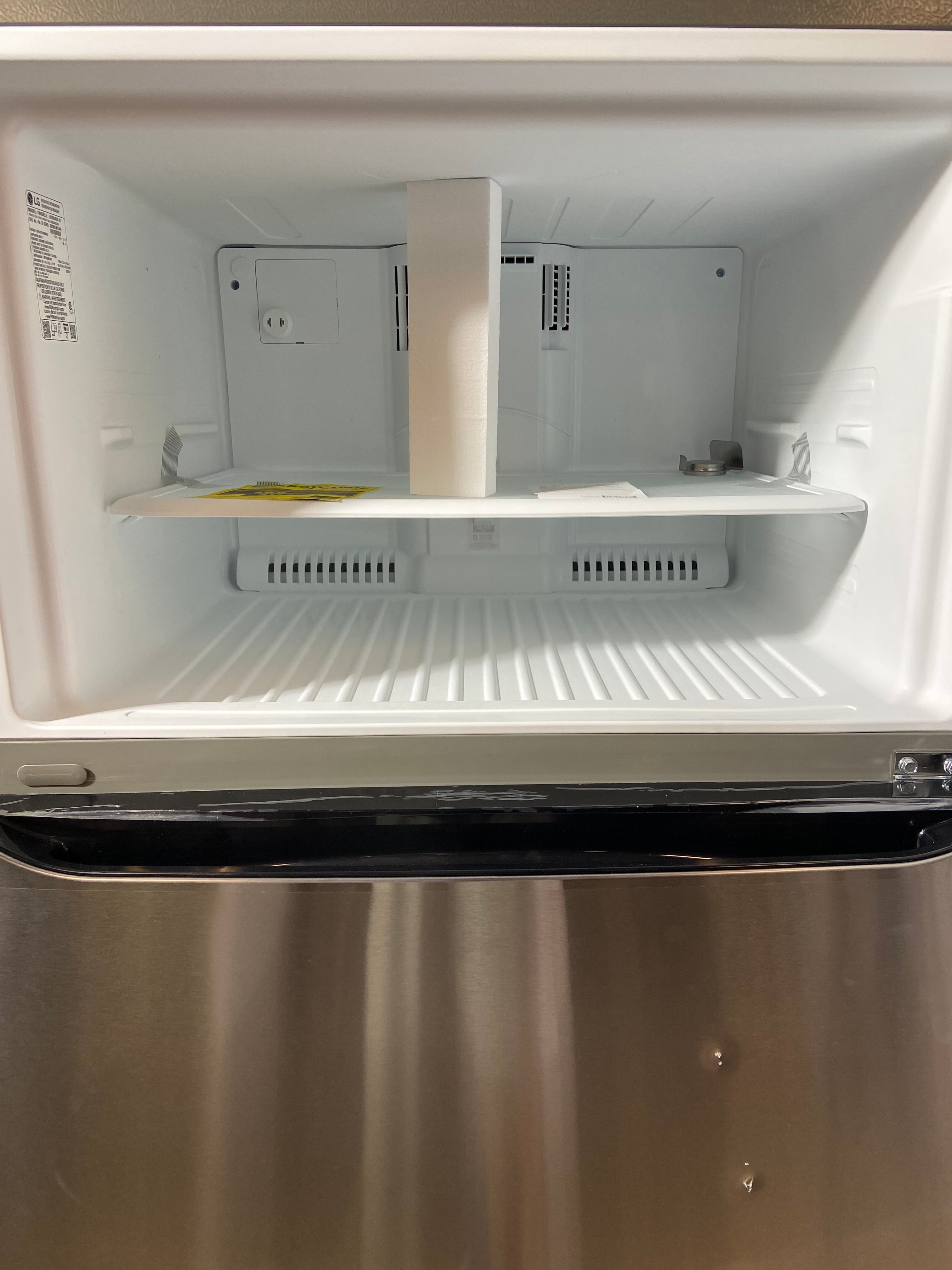LG 33” 24 cu. Ft Stainless Steel Top Freezer Refrigerator