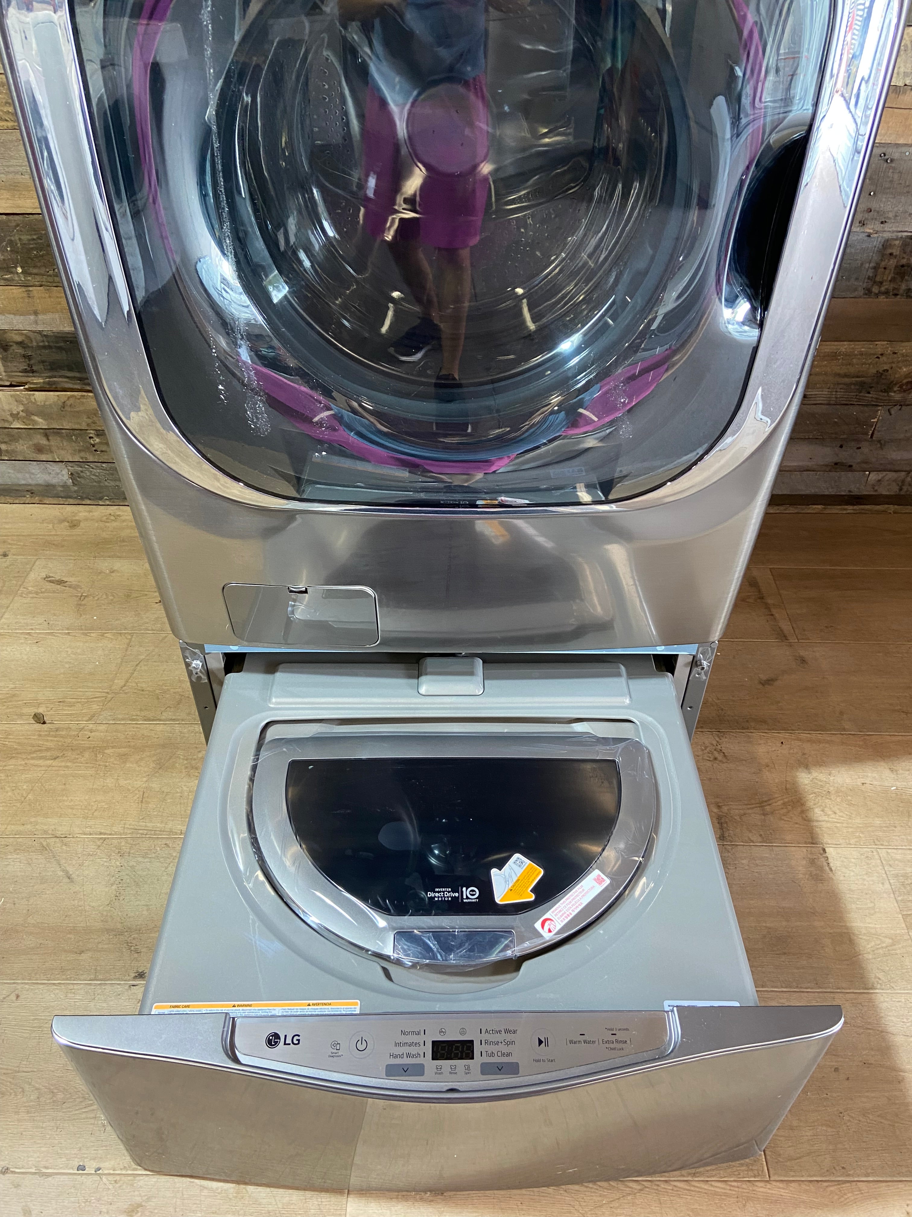 5.2 cu. ft. Mega Capacity Smart Wi-Fi Enabled Front Load Washer With LG 1.0 Cu. ft SideKick Pedestal Washer
