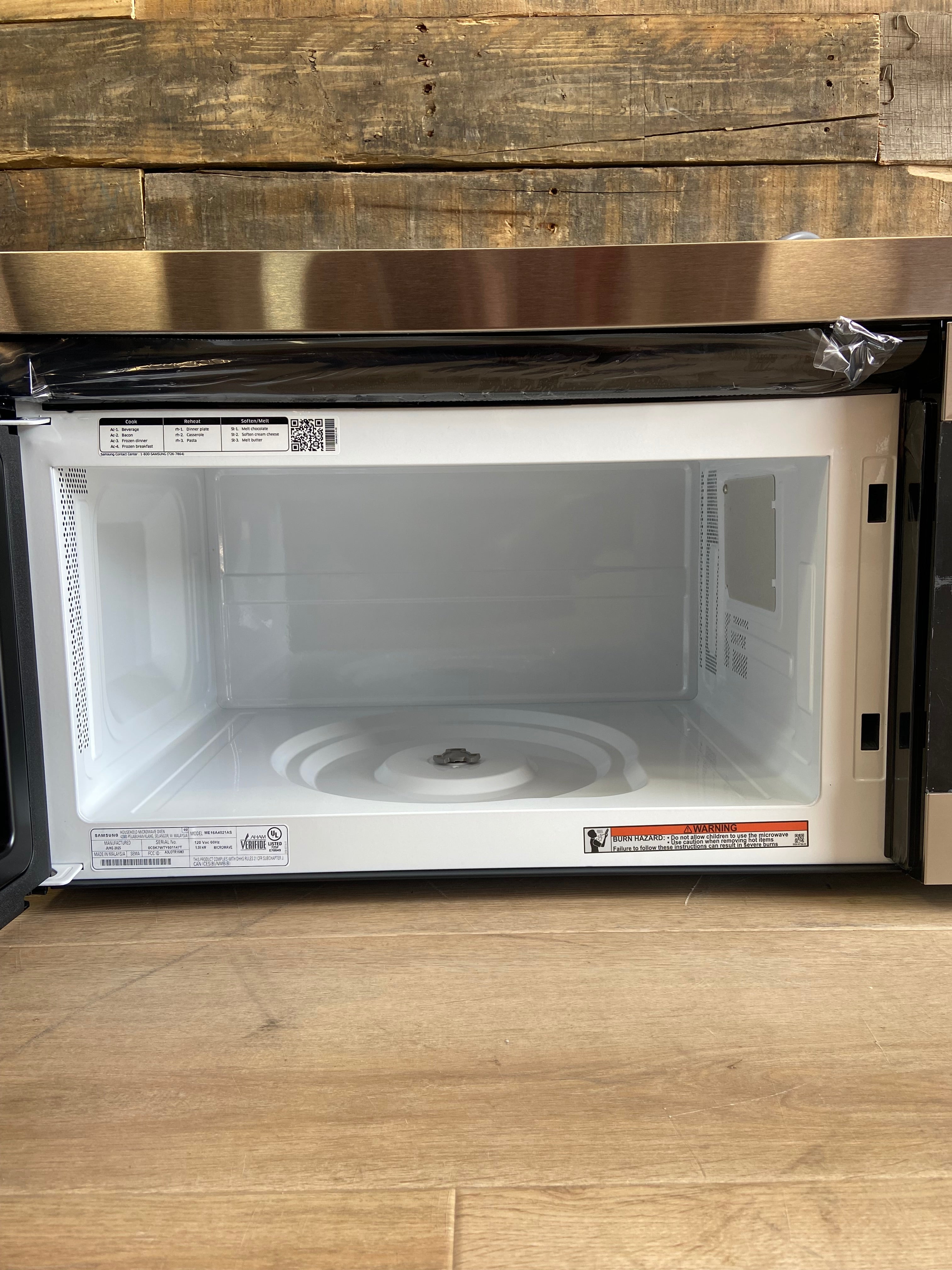 Stainless Samsung 1.6 cu. ft. 1000 W Over-the-Range Microwave with Auto Cook