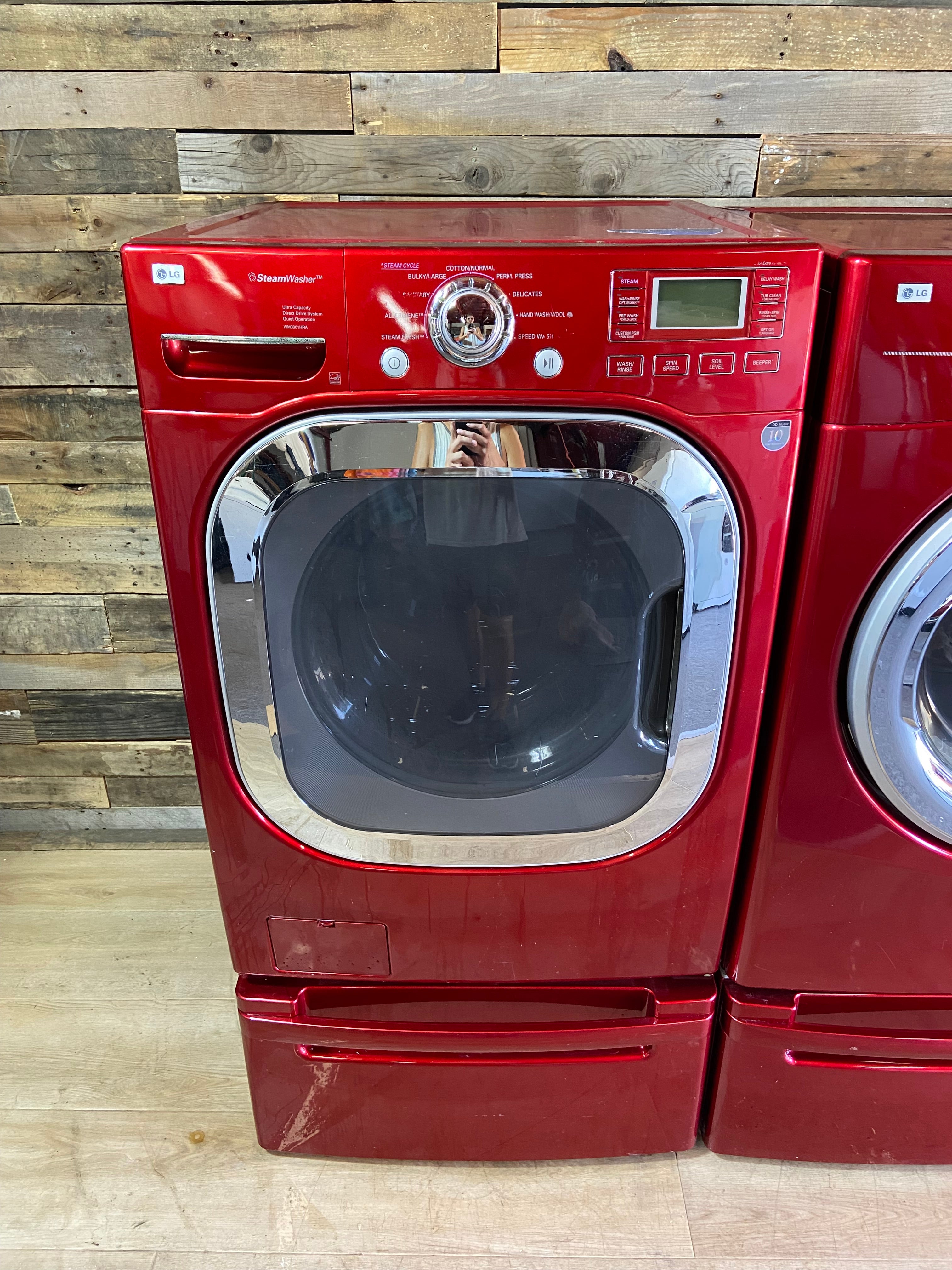 Red LG Front Load Washer & Dryer Set With Pedestals