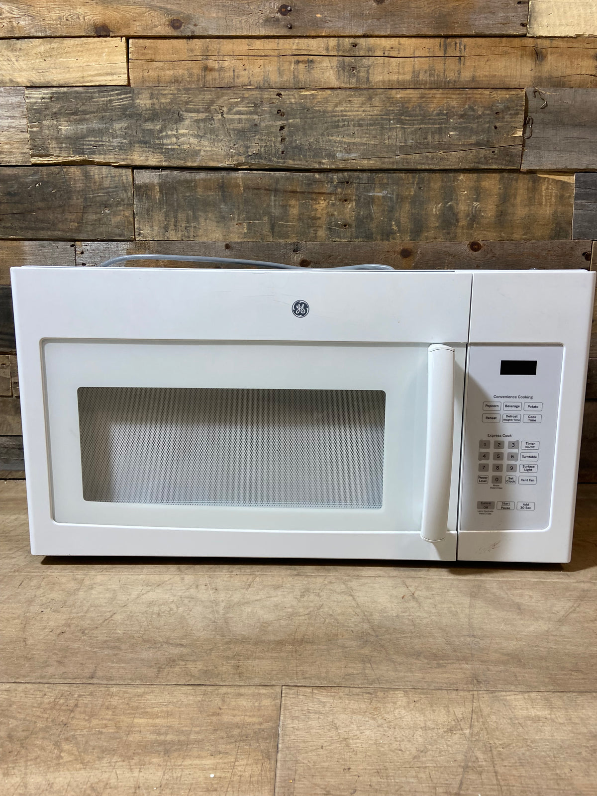 White GE Over The Range Microwave