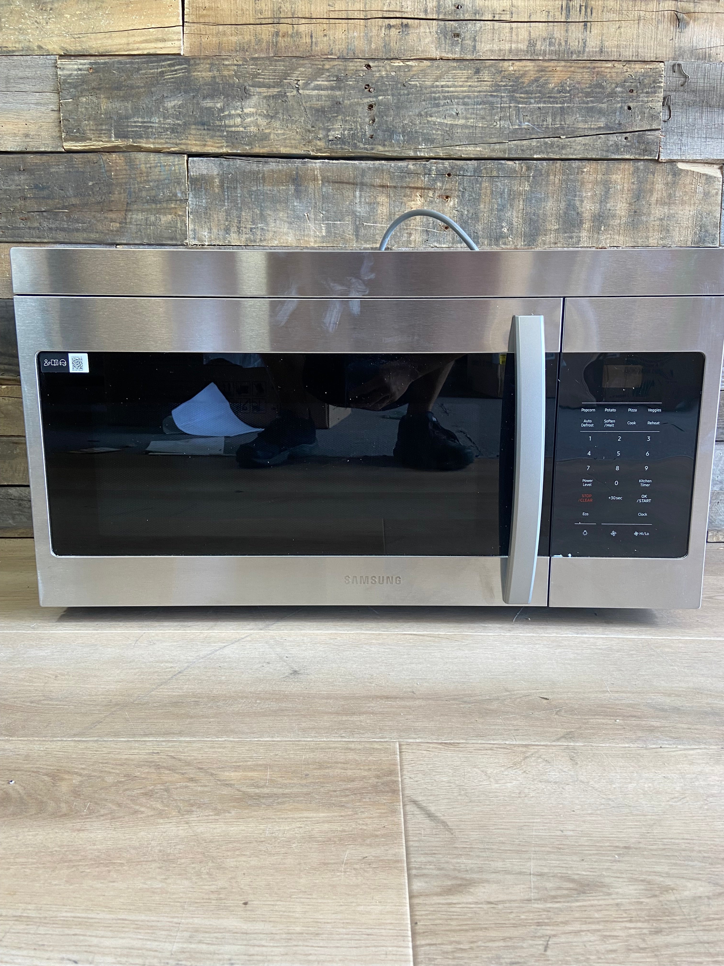Stainless Samsung 1.6 cu. ft. 1000 W Over-the-Range Microwave with Auto Cook