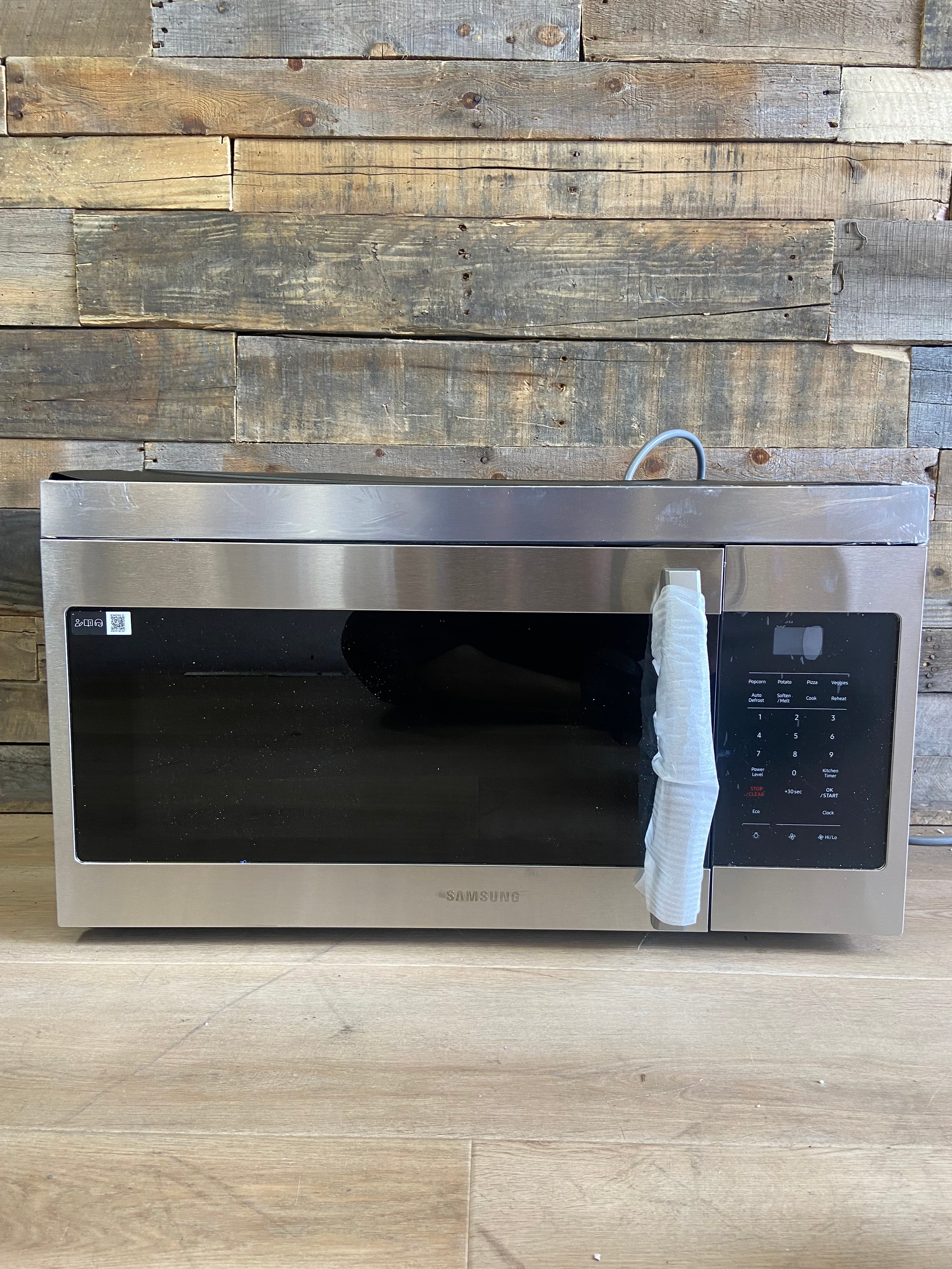Stainless Samsung 1.6 cu. ft. 1000 W Over-the-Range Microwave with Auto Cook