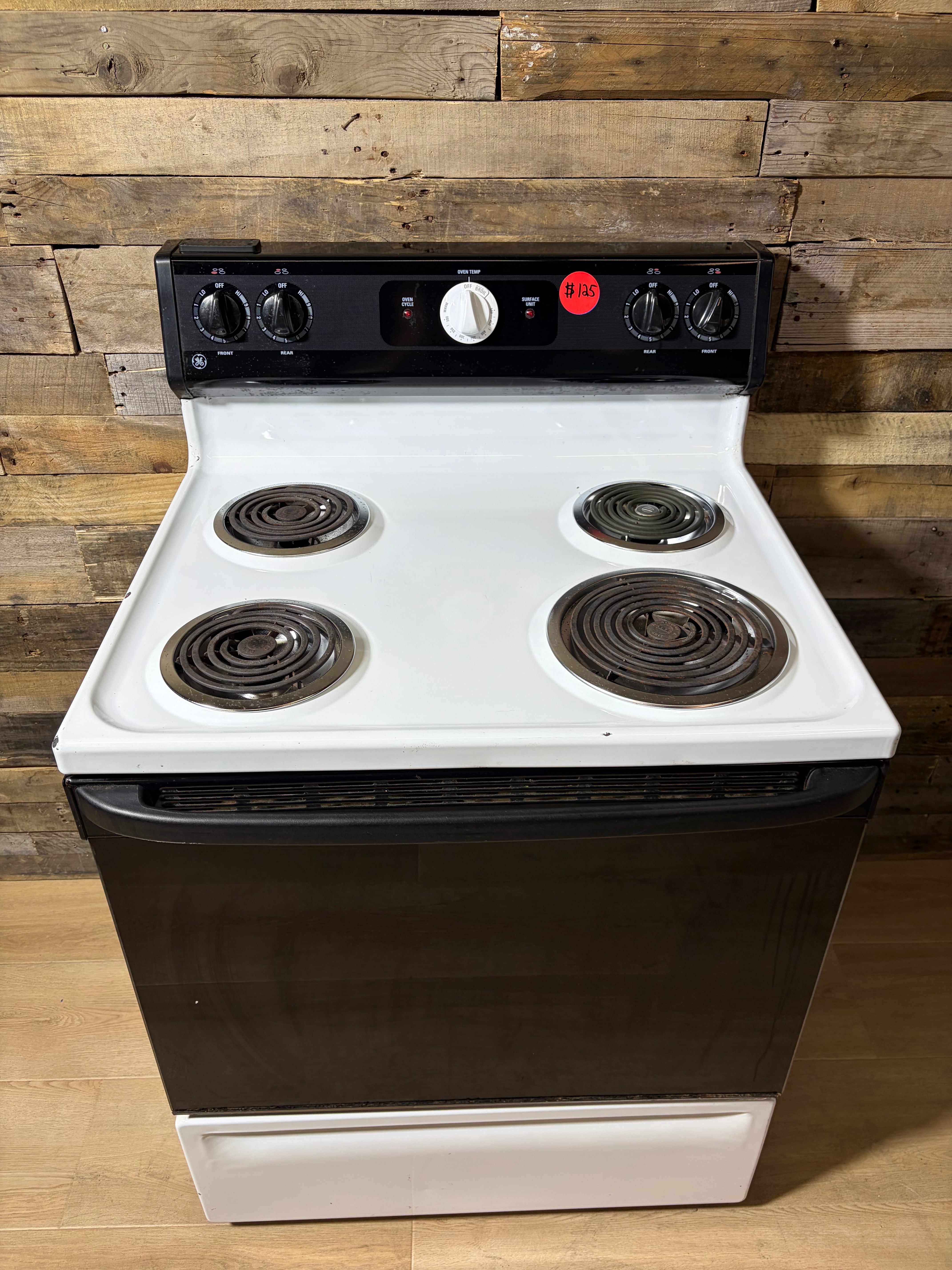 GE White and Black Coil Top Range