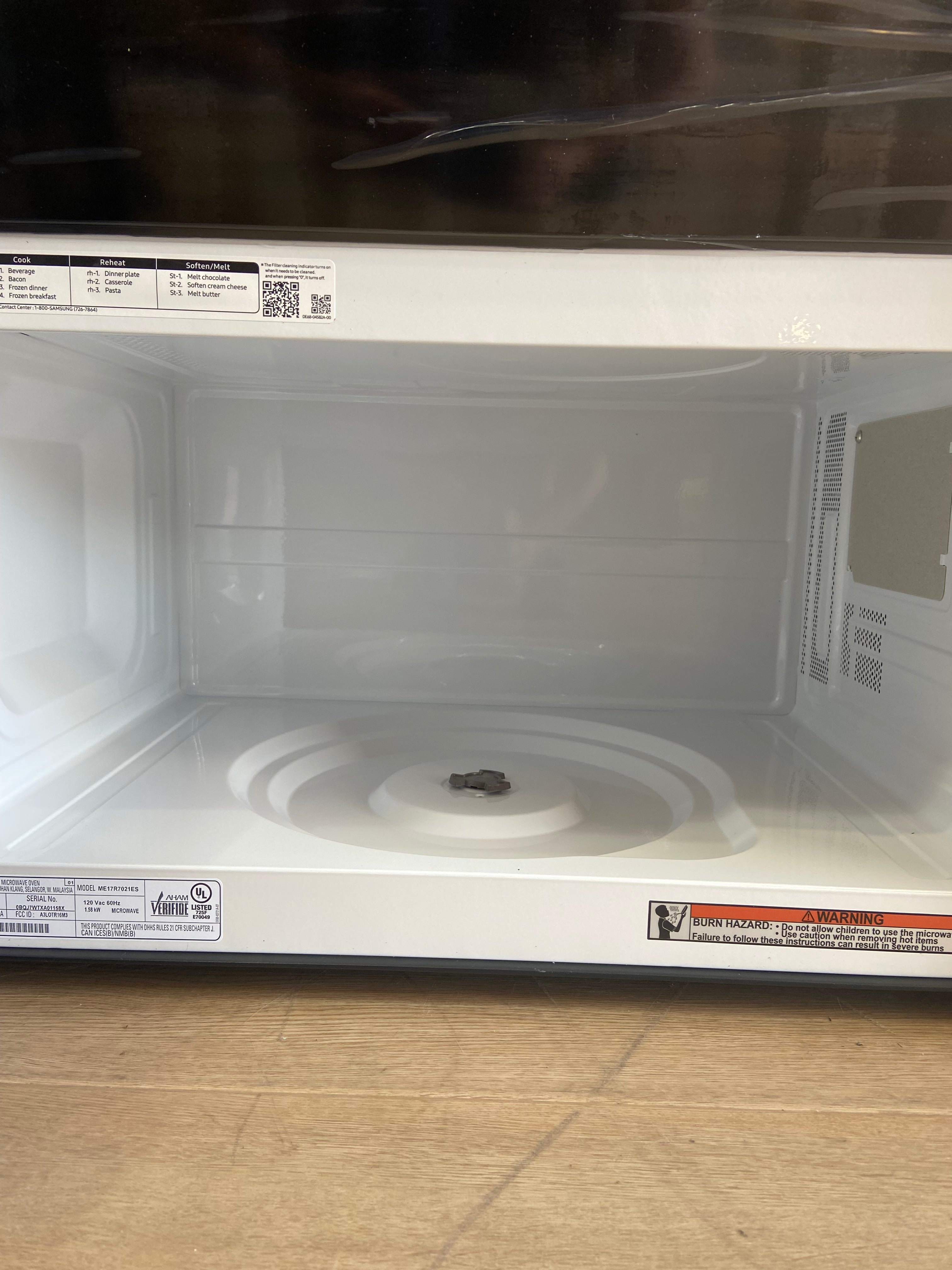 Stainless Samsung 1.6 cu. ft. 1000 W Over-the-Range Microwave with Auto Cook
