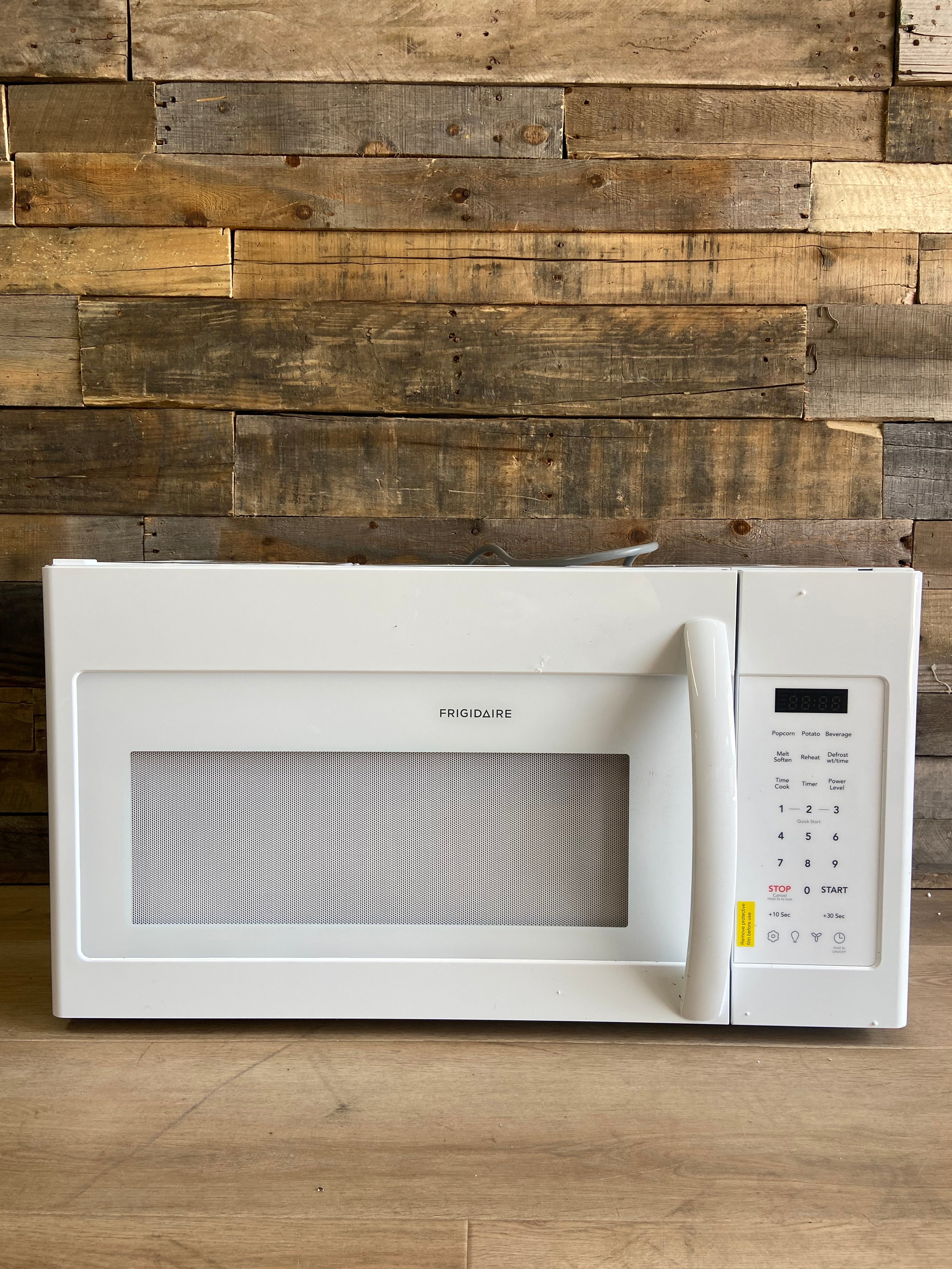 White Frigidaire 1.8 Cu. Ft. Over-The-Range Microwave