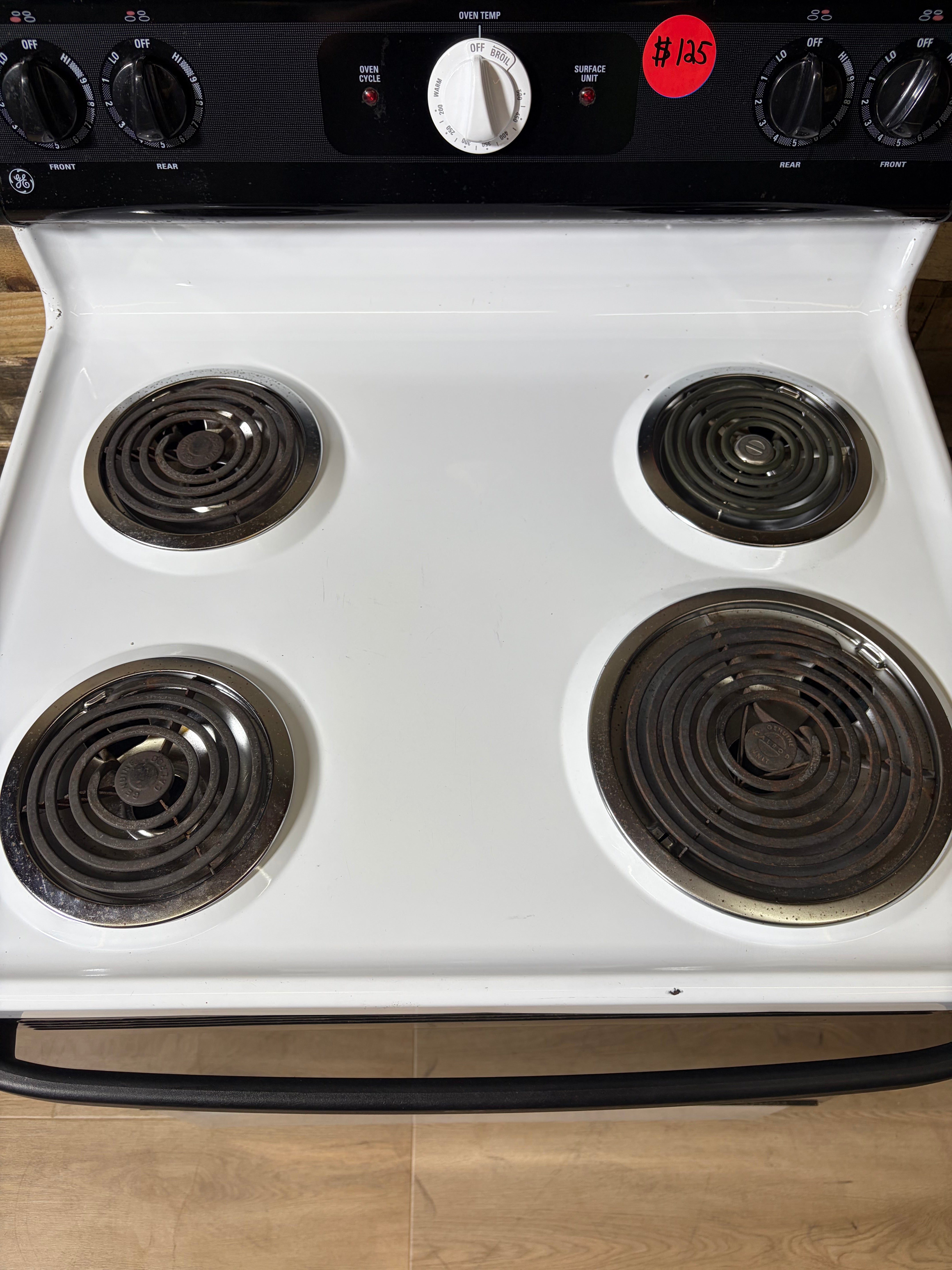 GE White and Black Coil Top Range