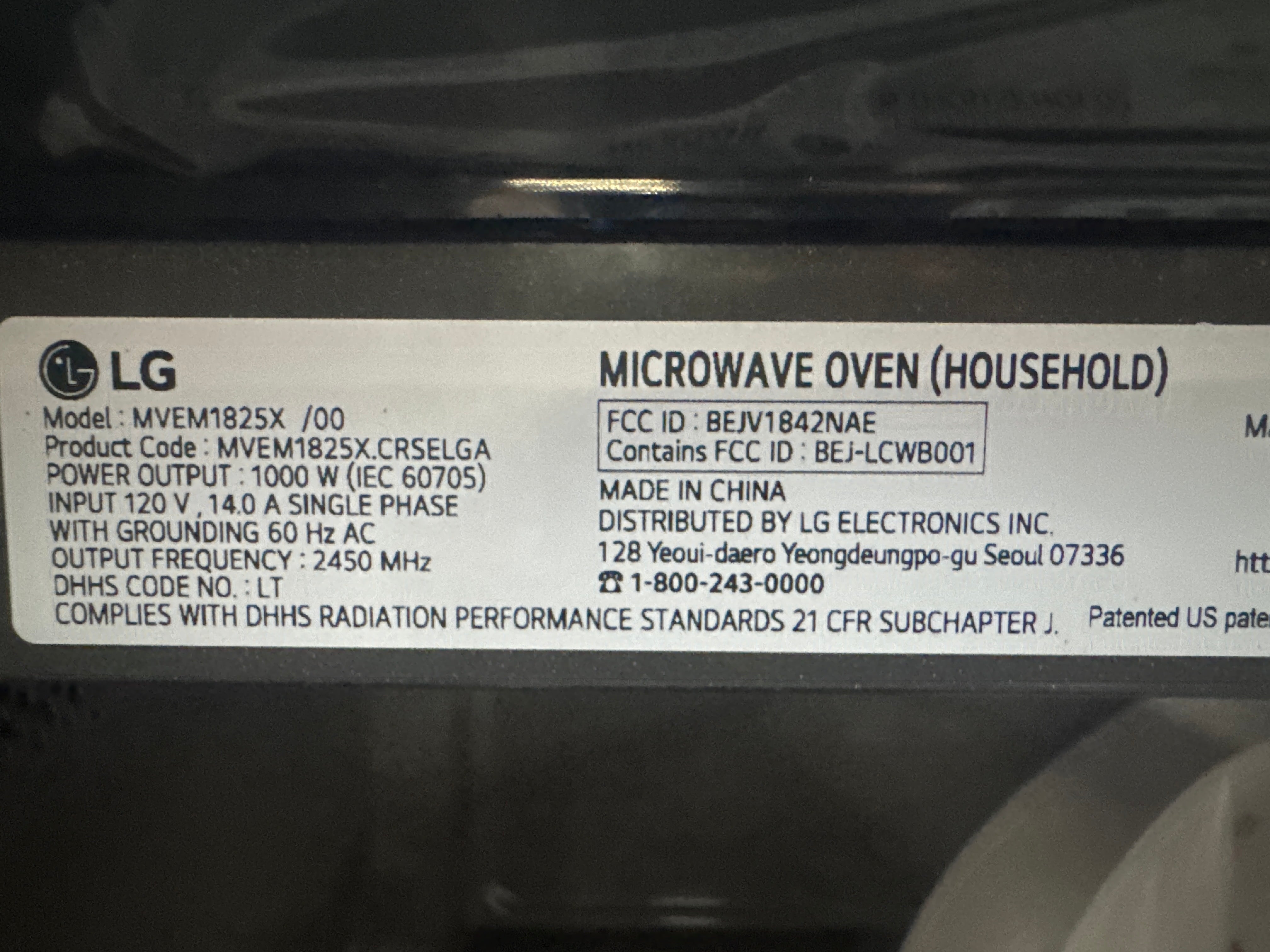 Black and Stainless 1.8 cu. ft. Smart Over-the-Range Microwave Oven with EasyClean®