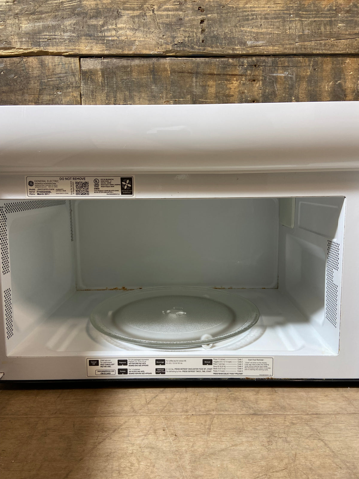 White GE Over The Range Microwave