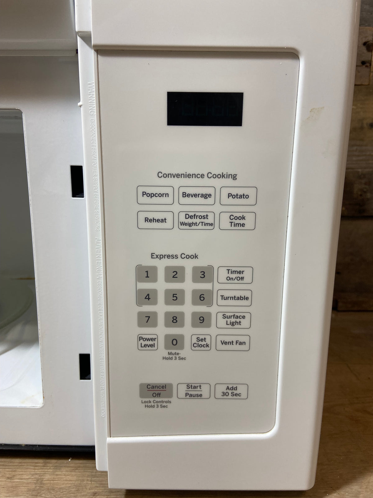 White GE Over The Range Microwave