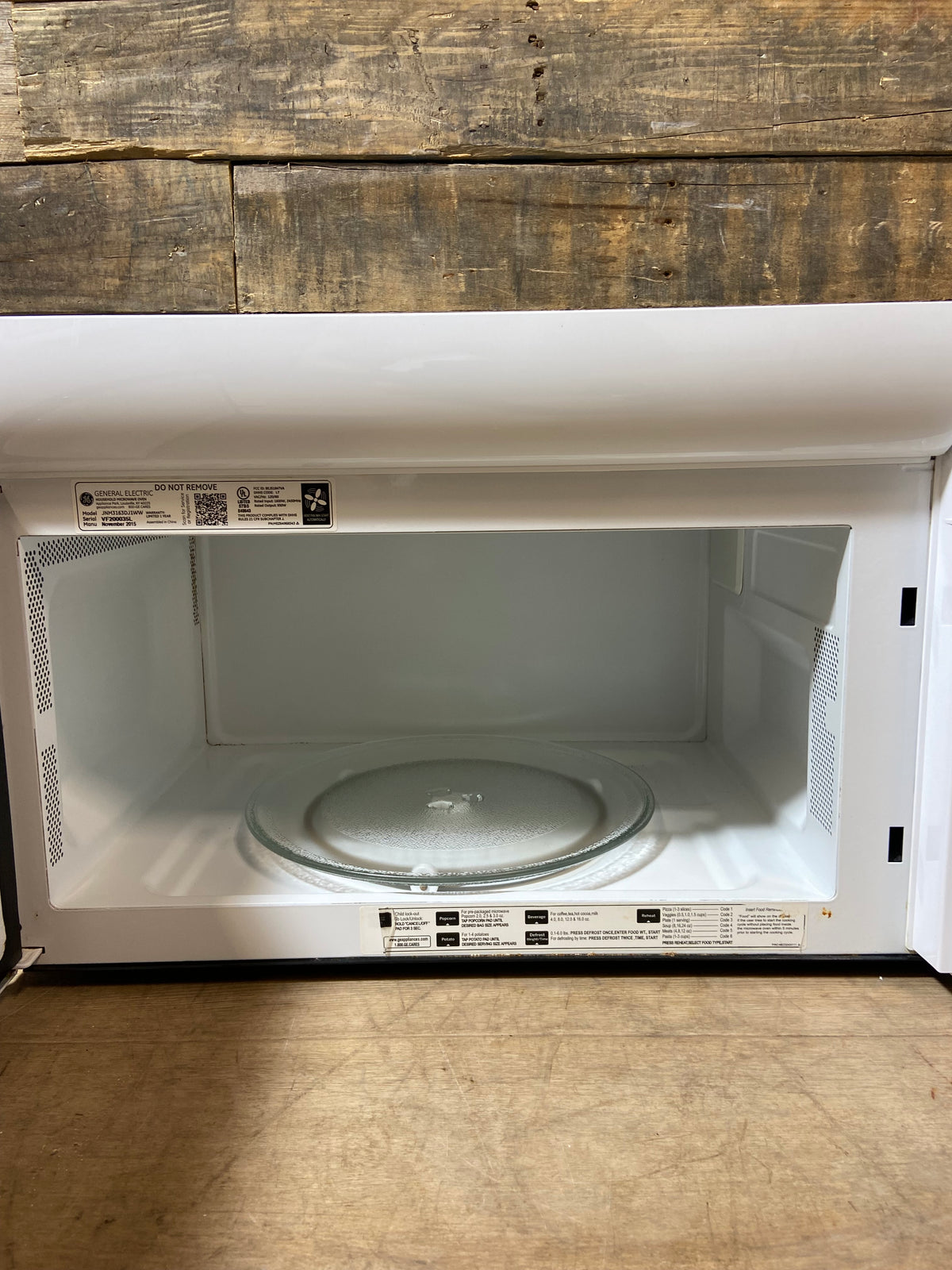 White GE Over The Range Microwave