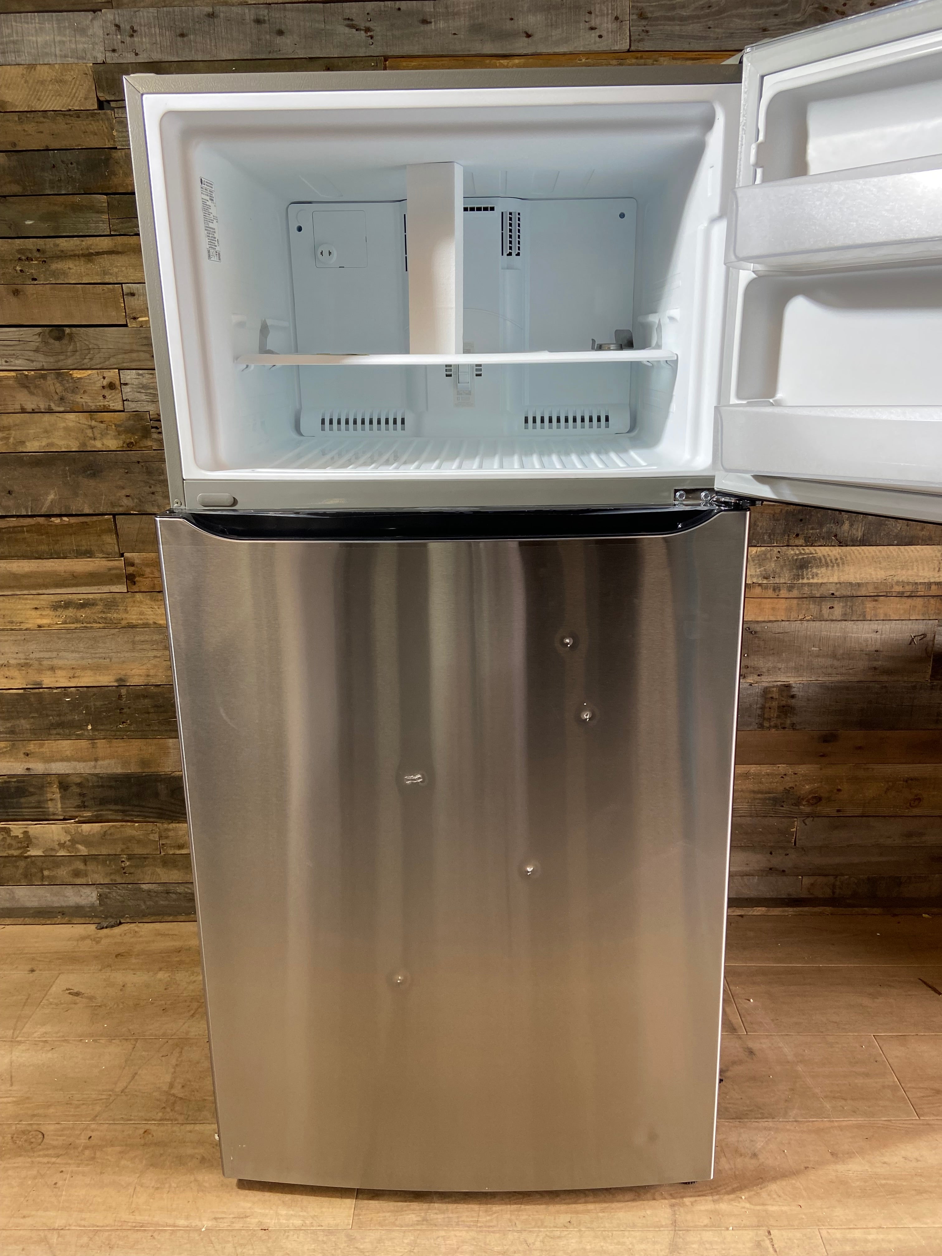 LG 33” 24 cu. Ft Stainless Steel Top Freezer Refrigerator