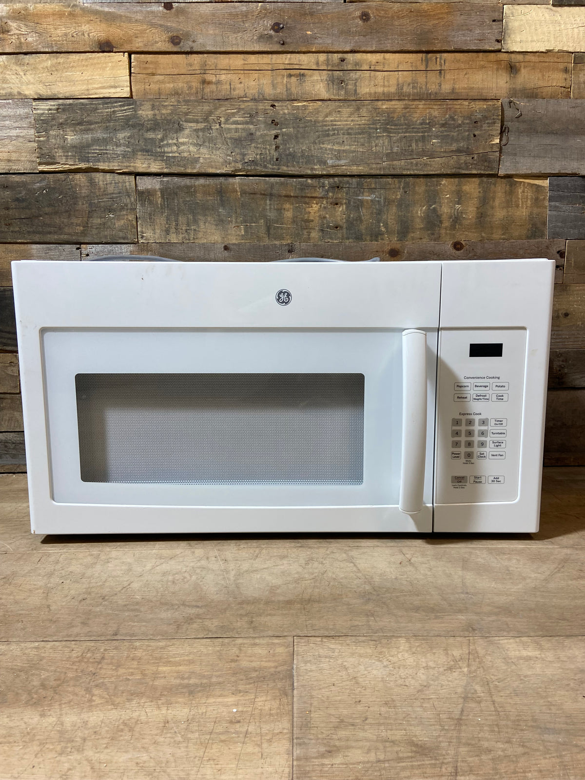 White GE Over The Range Microwave