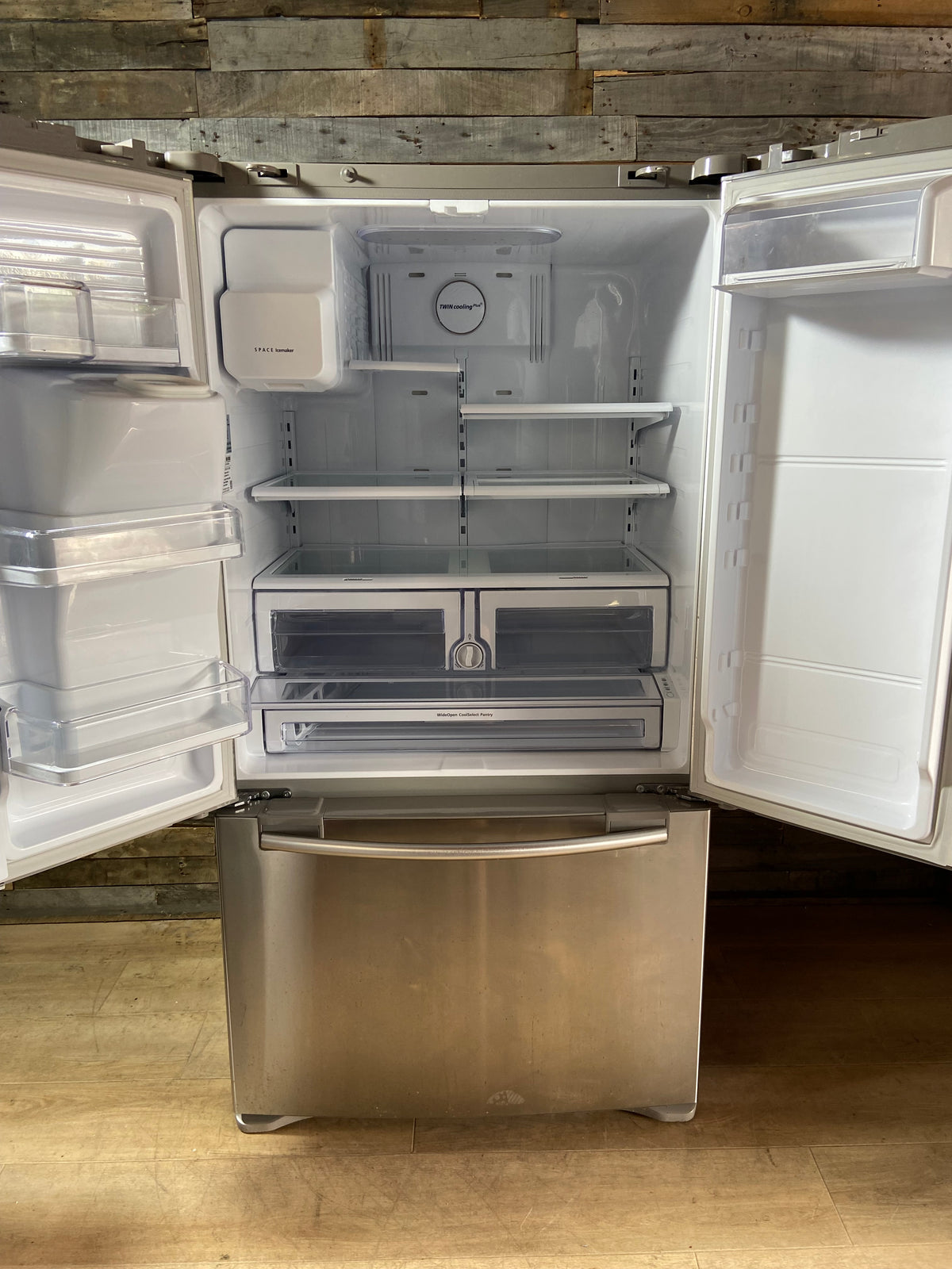 Samsung French Door Refrigerator (missing a couple shelves on the door)
