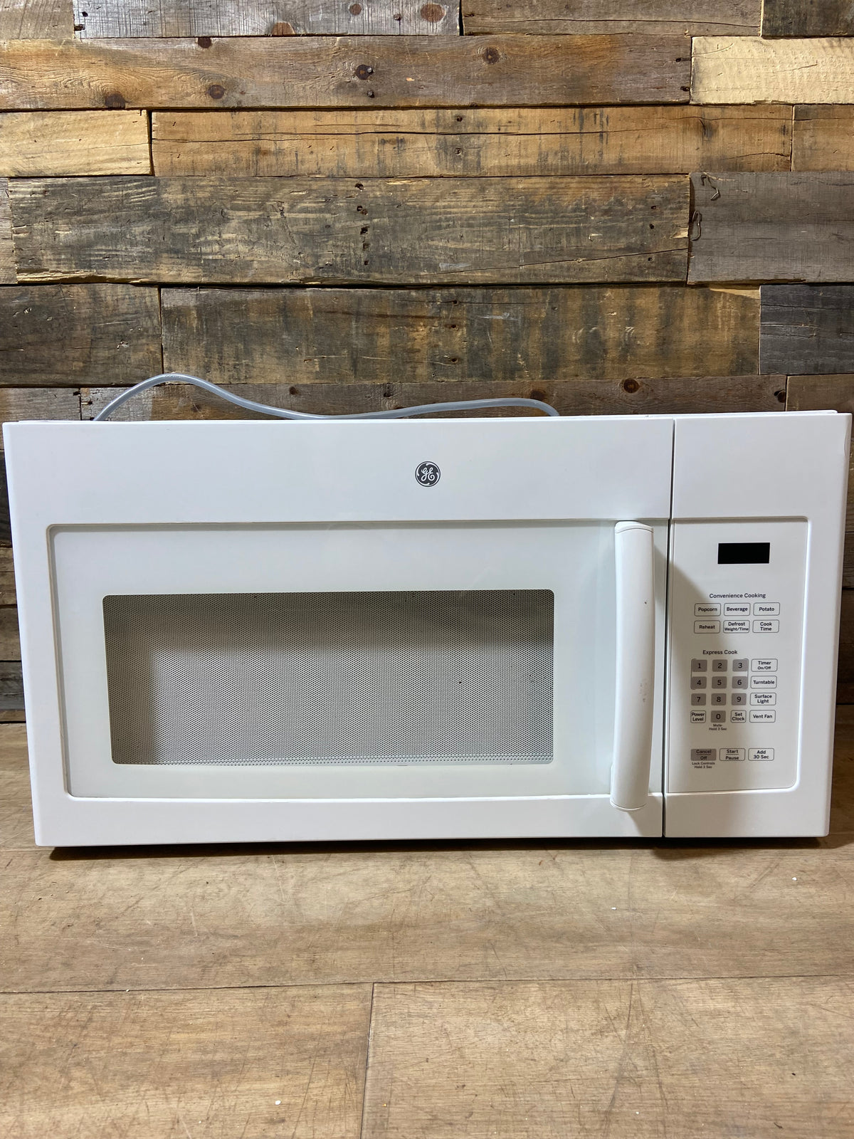 White GE Over The Range Microwave