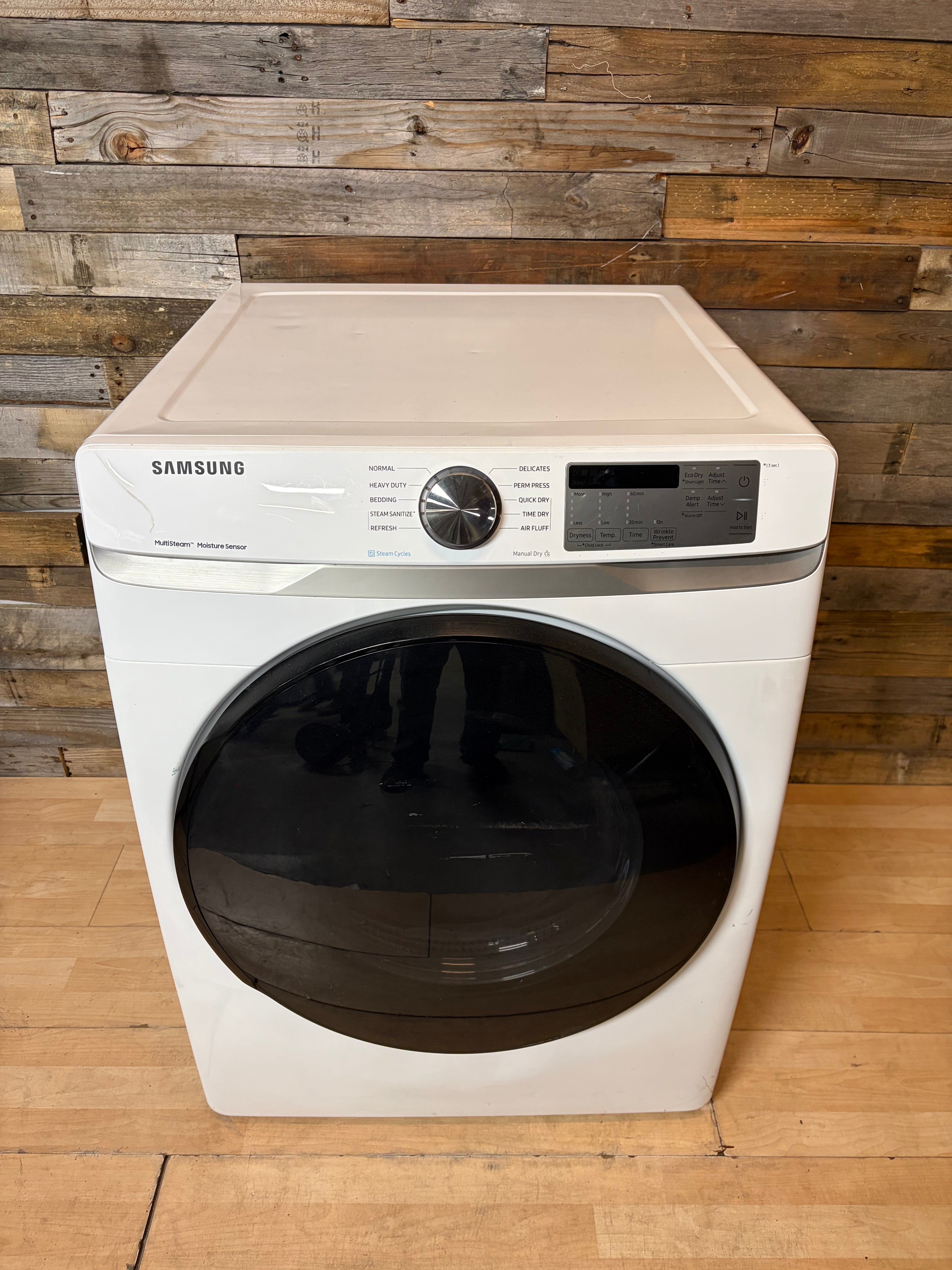 White Samsung Front Load Style Steam Dryer