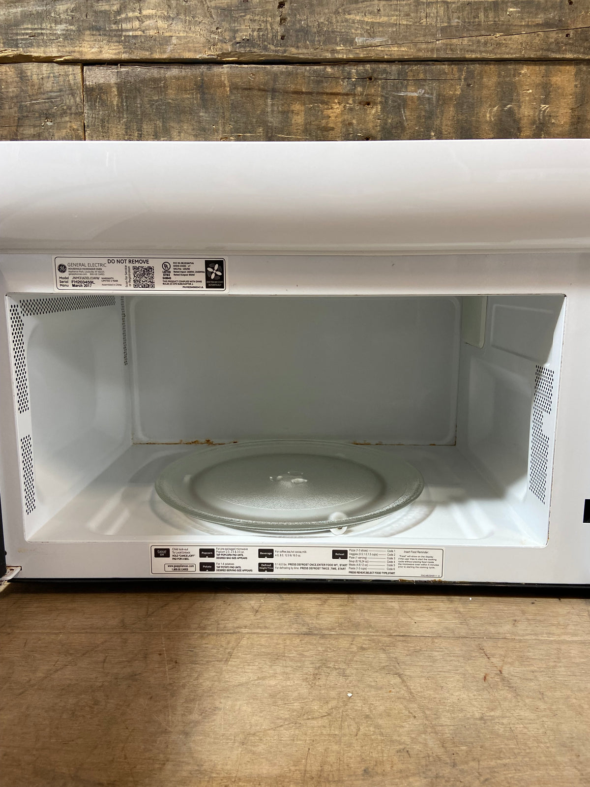 White GE Over The Range Microwave