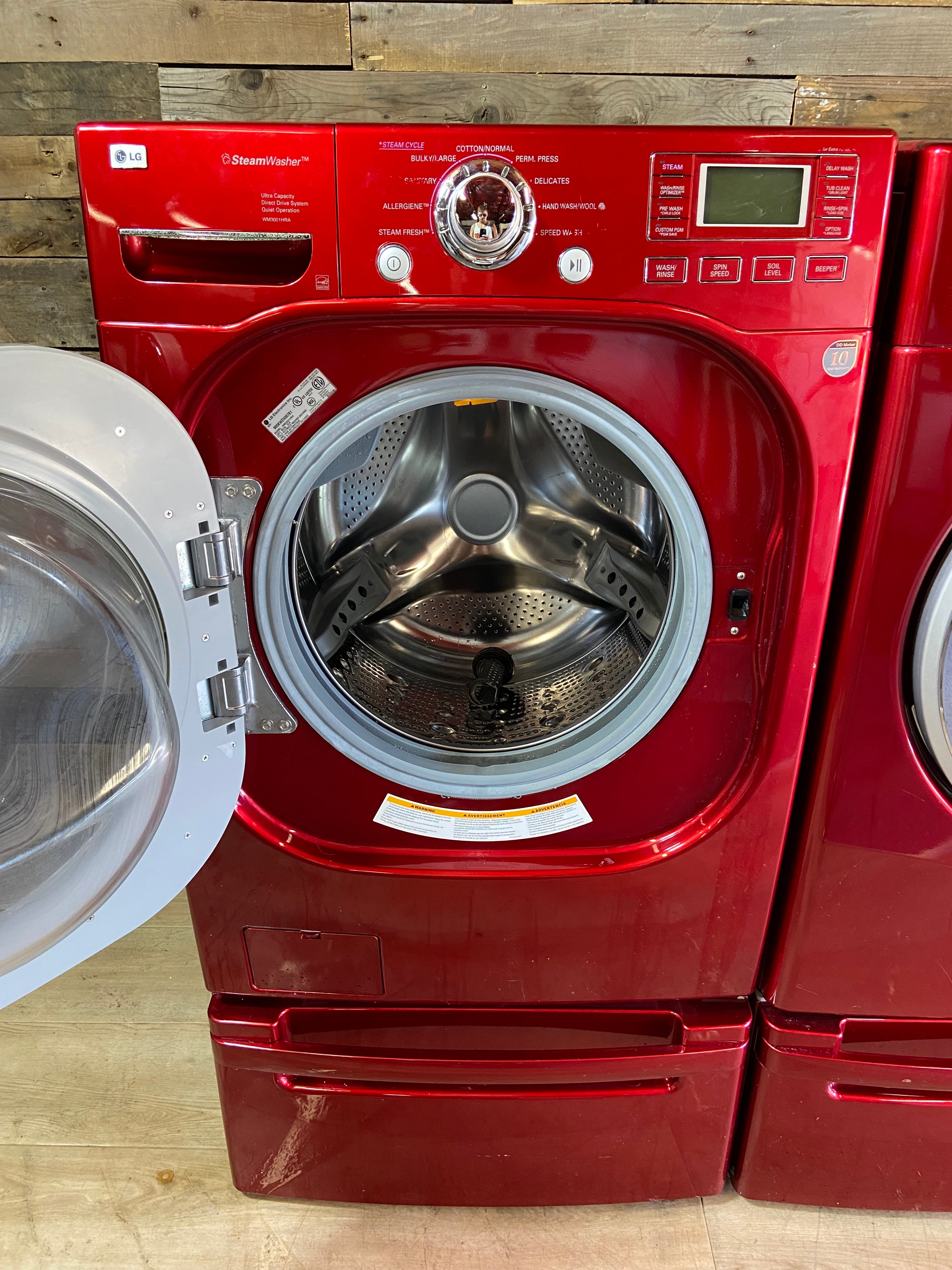 Red LG Front Load Washer & Dryer Set With Pedestals
