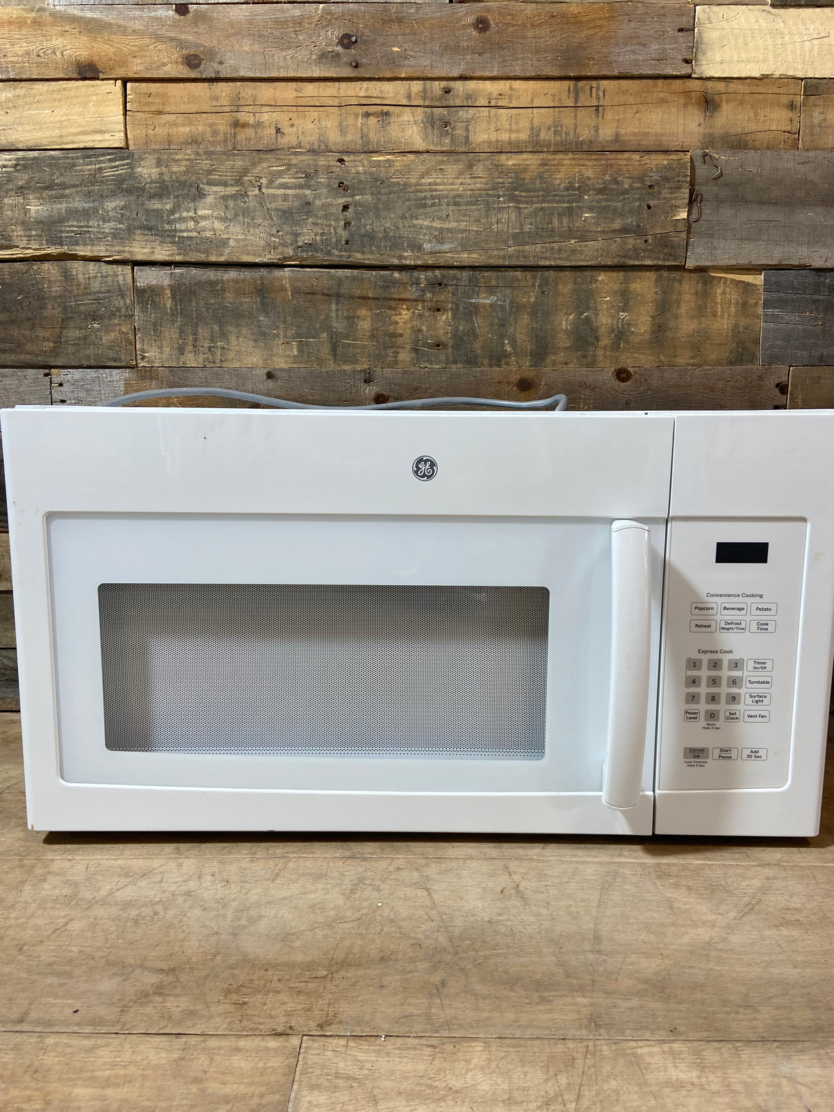 White GE Over The Range Microwave