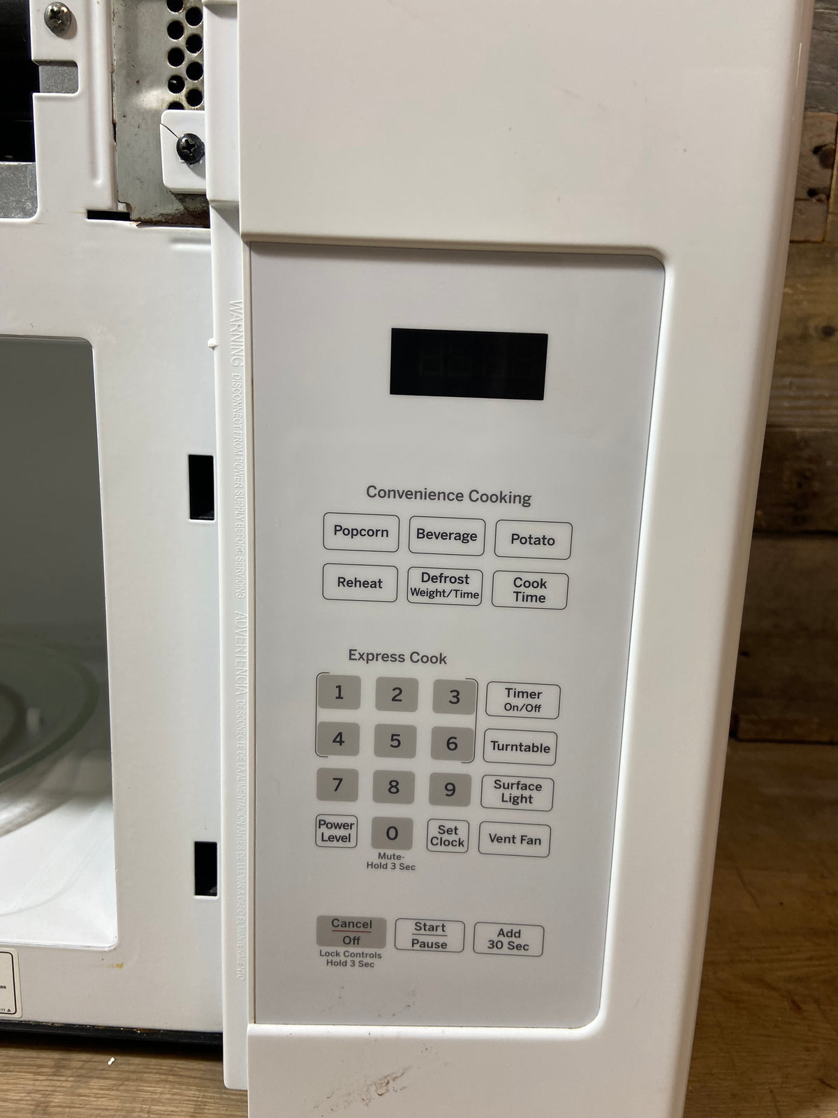 White GE Over The Range Microwave