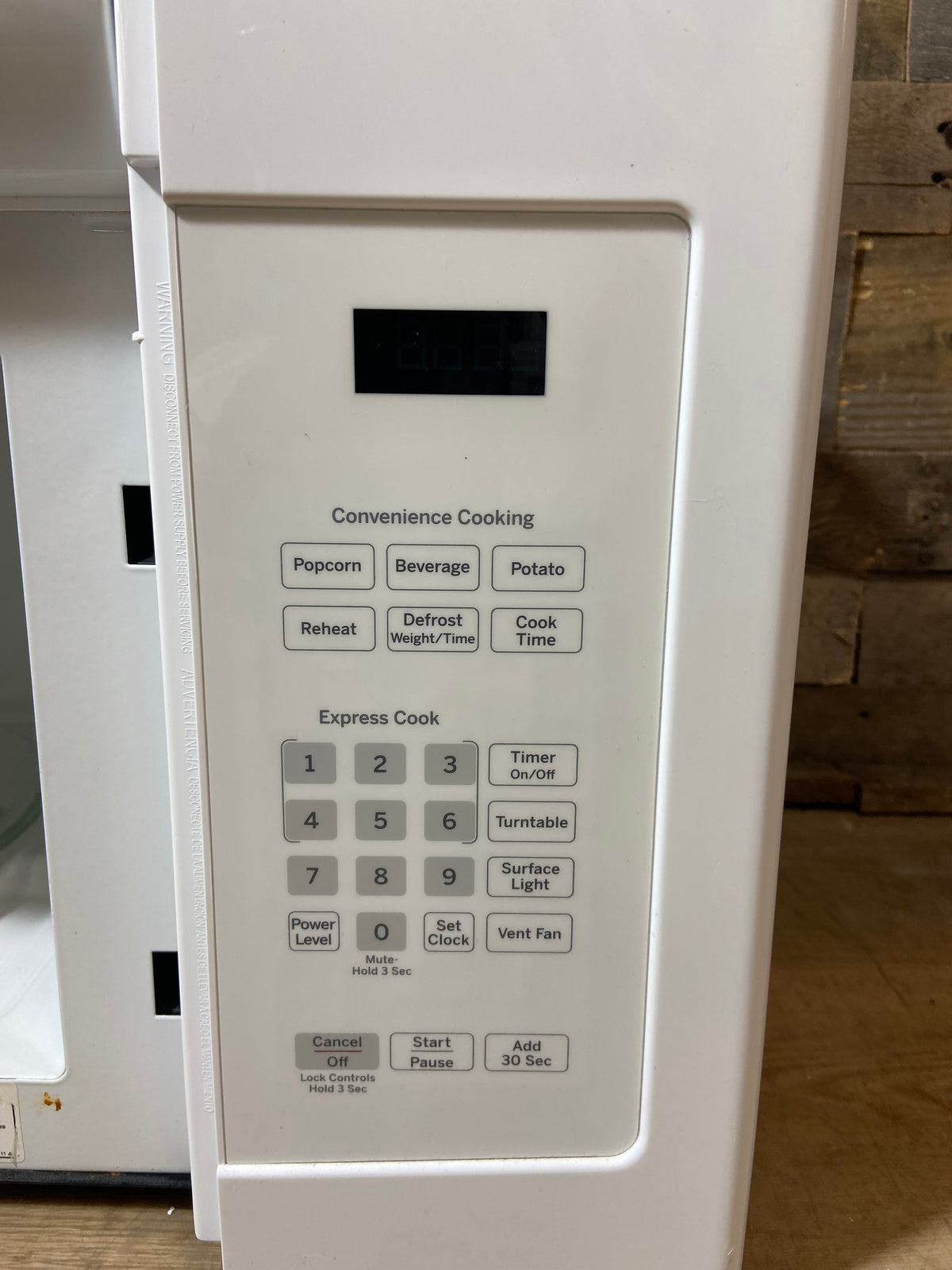 White GE Over The Range Microwave