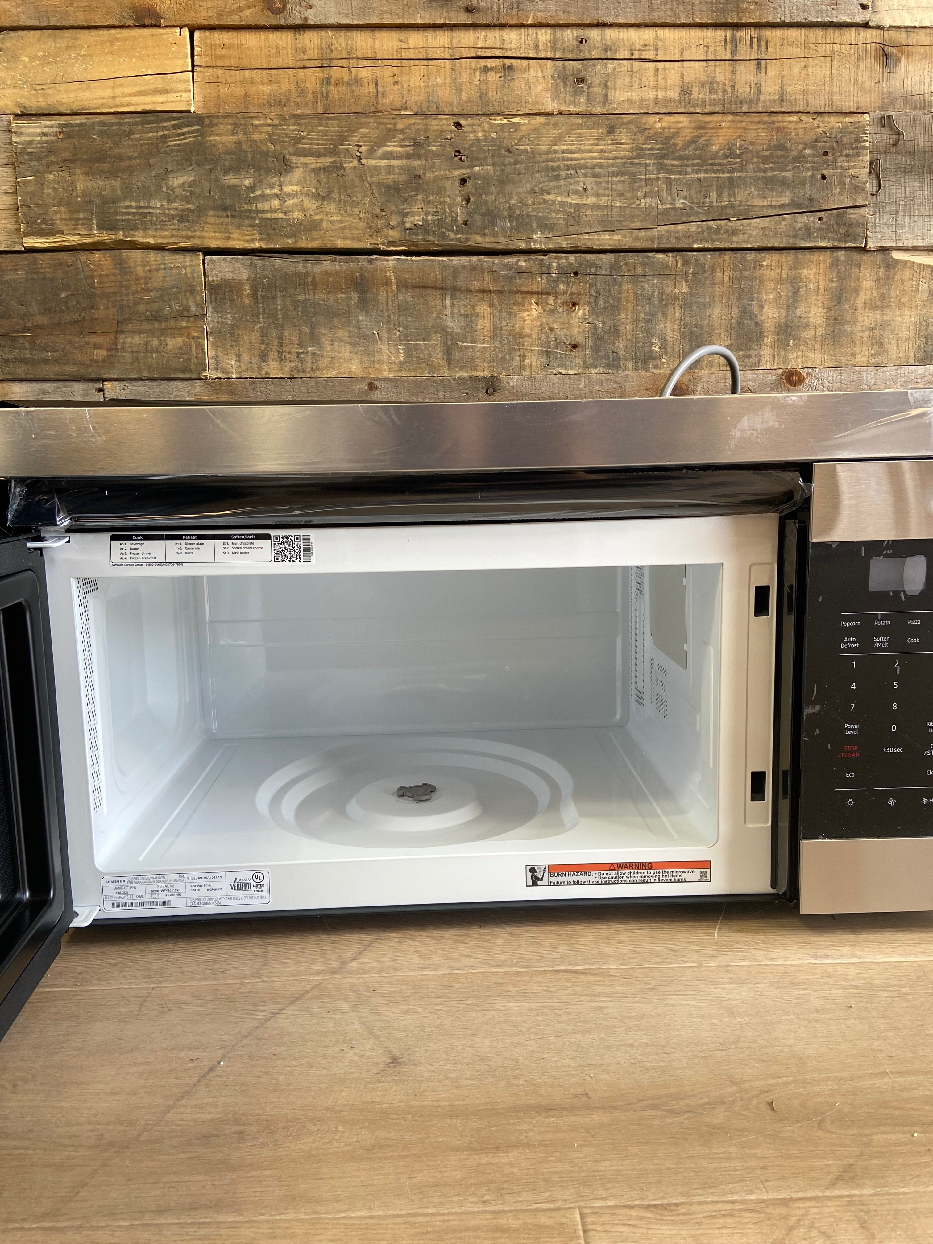 Stainless Samsung 1.6 cu. ft. 1000 W Over-the-Range Microwave with Auto Cook