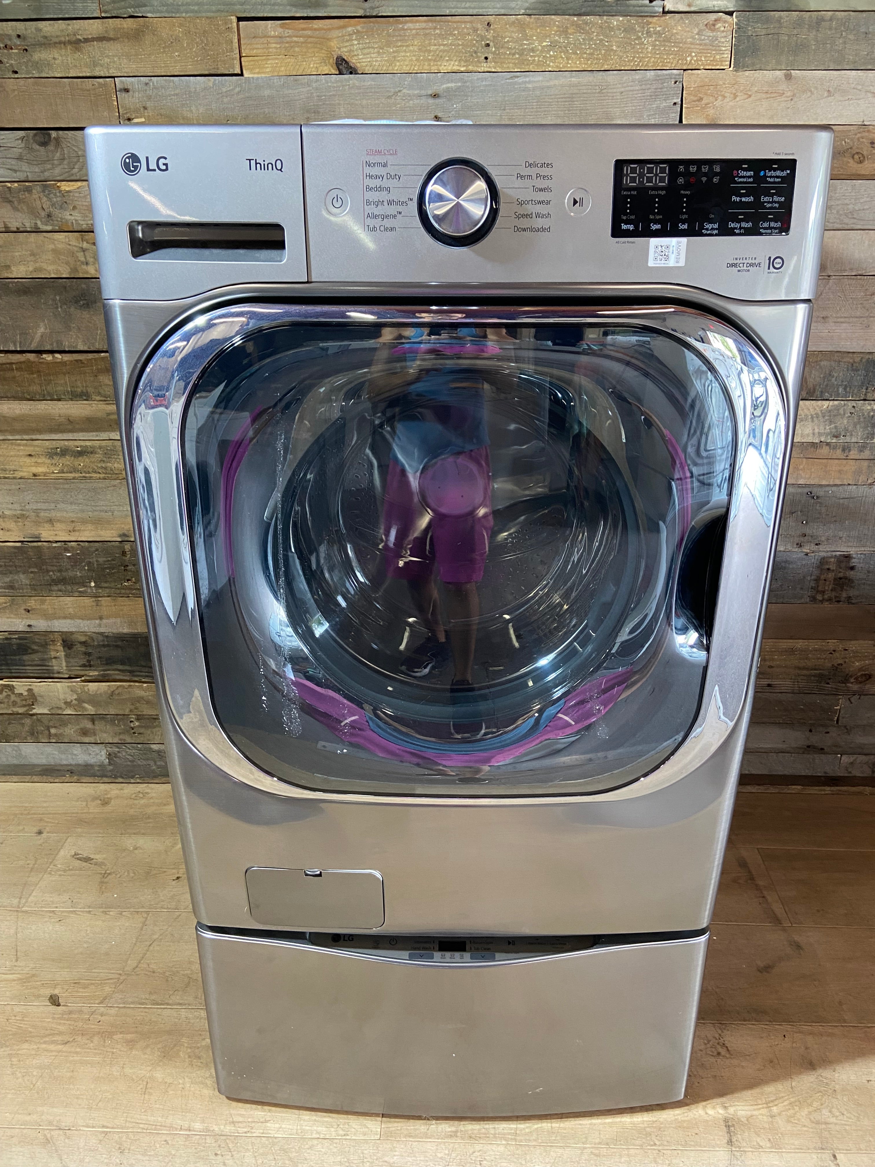 5.2 cu. ft. Mega Capacity Smart Wi-Fi Enabled Front Load Washer With LG 1.0 Cu. ft SideKick Pedestal Washer