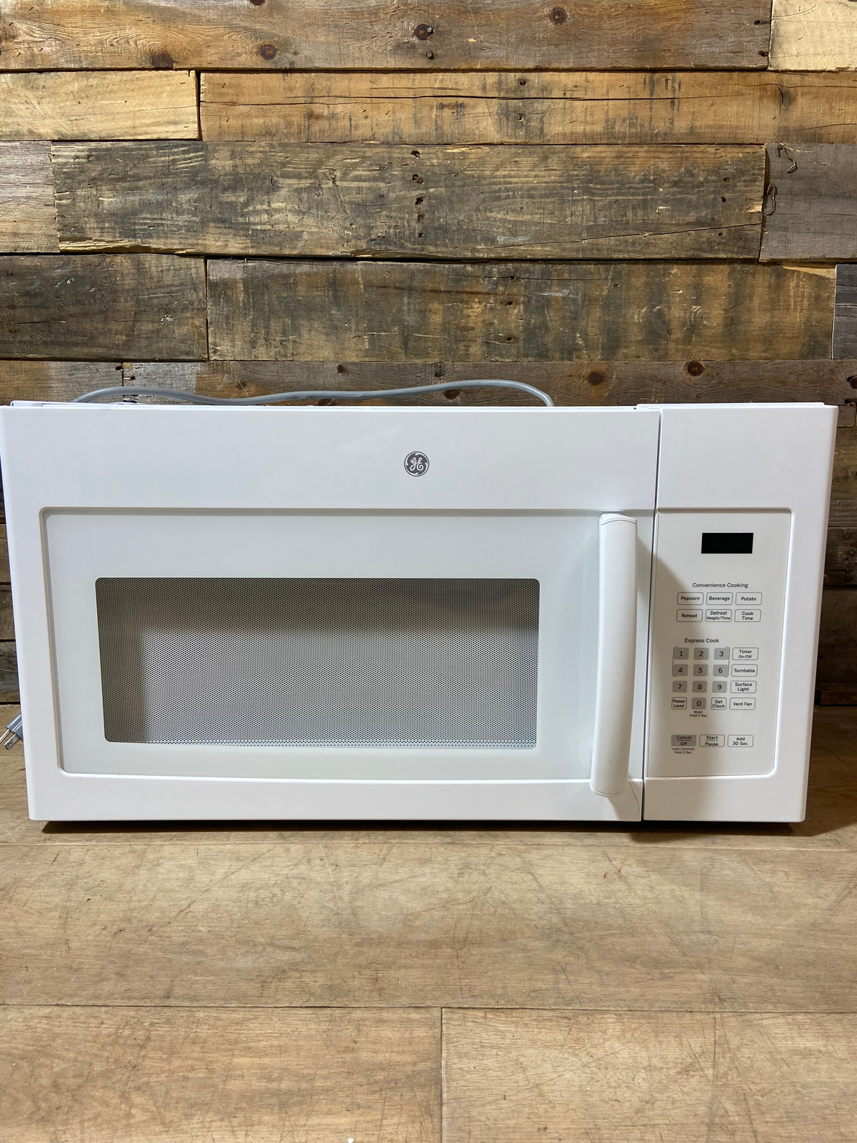 White GE Over The Range Microwave