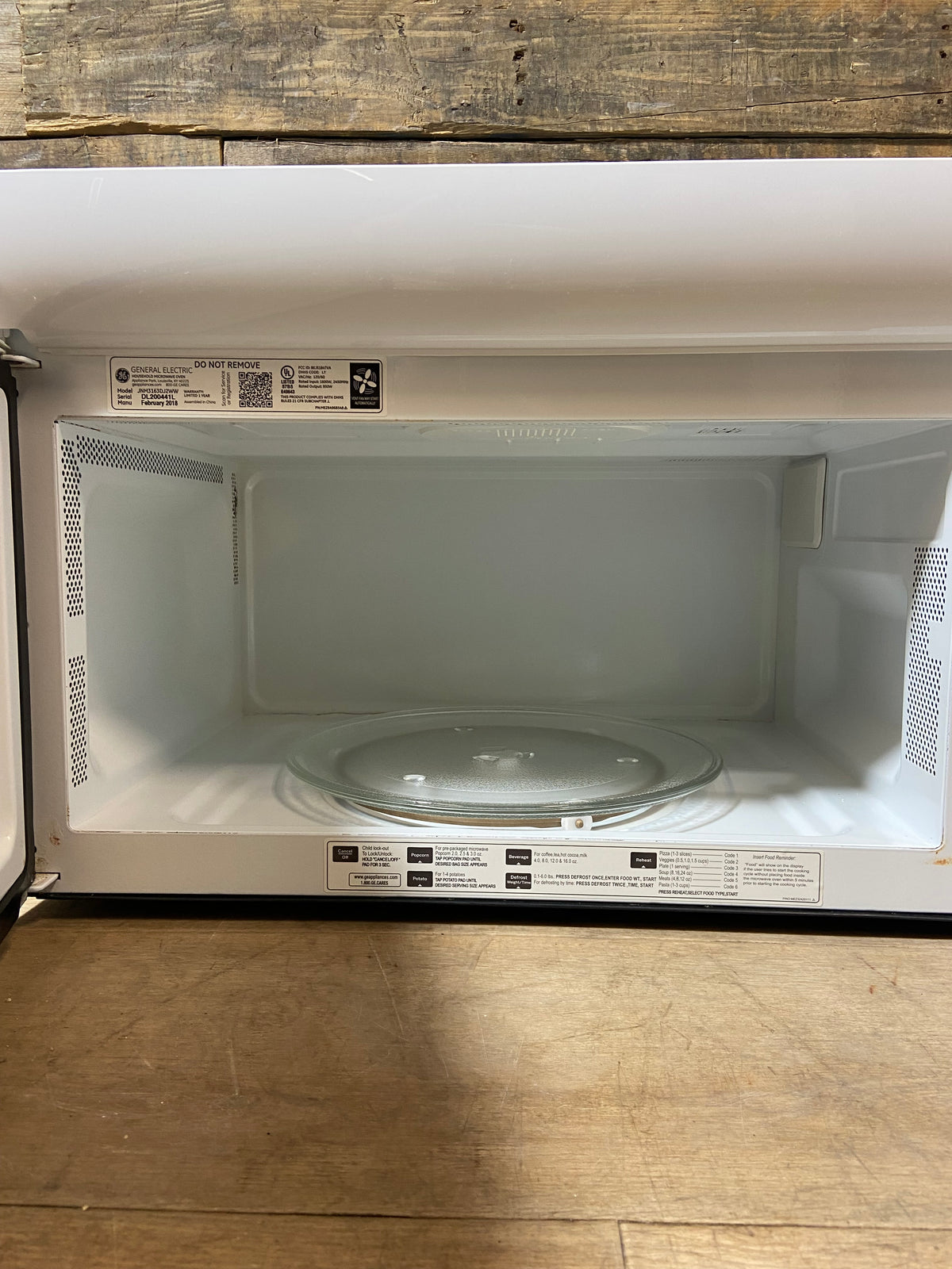 White GE Over The Range Microwave