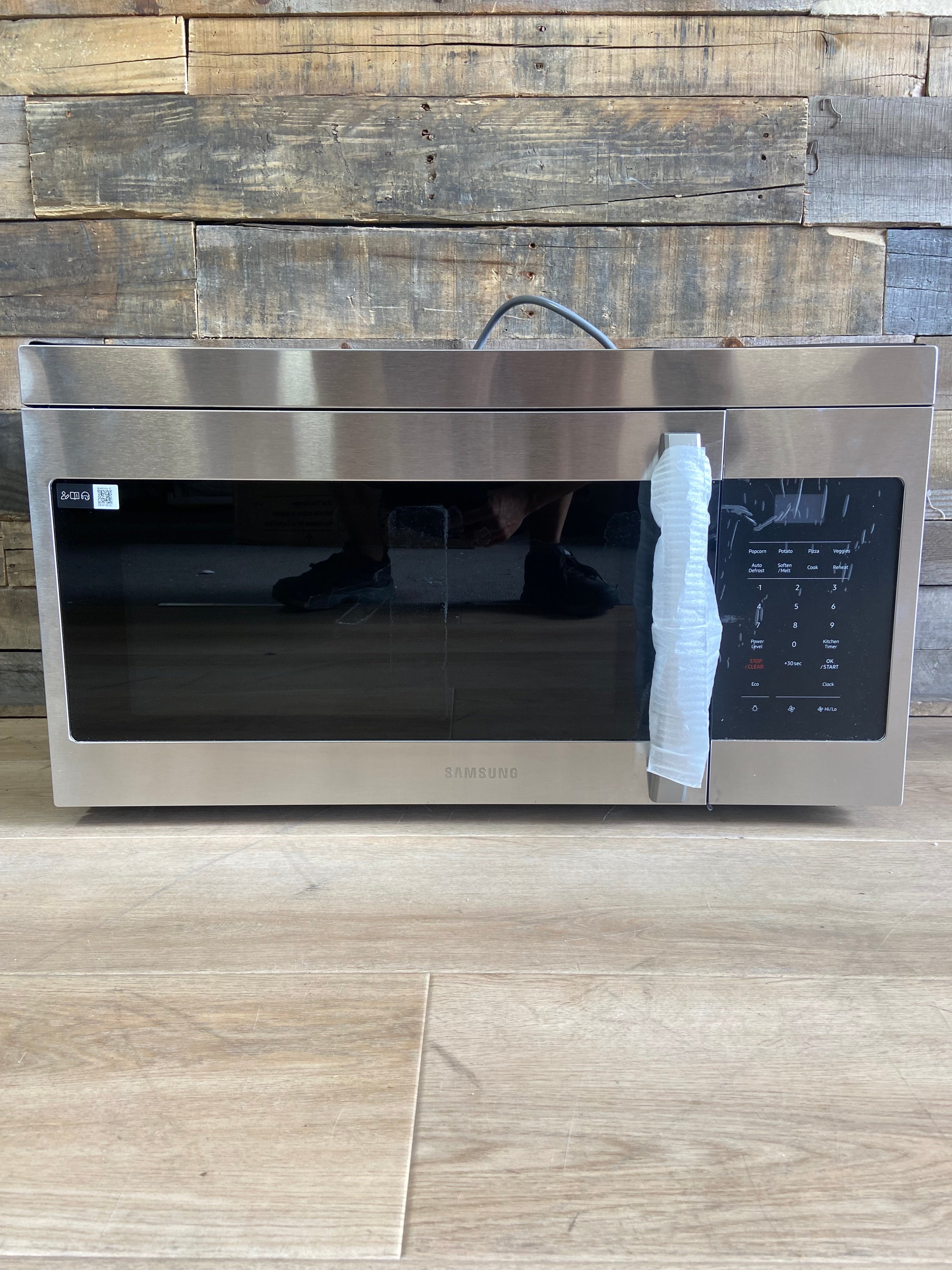 Stainless Samsung 1.6 cu. ft. 1000 W Over-the-Range Microwave with Auto Cook