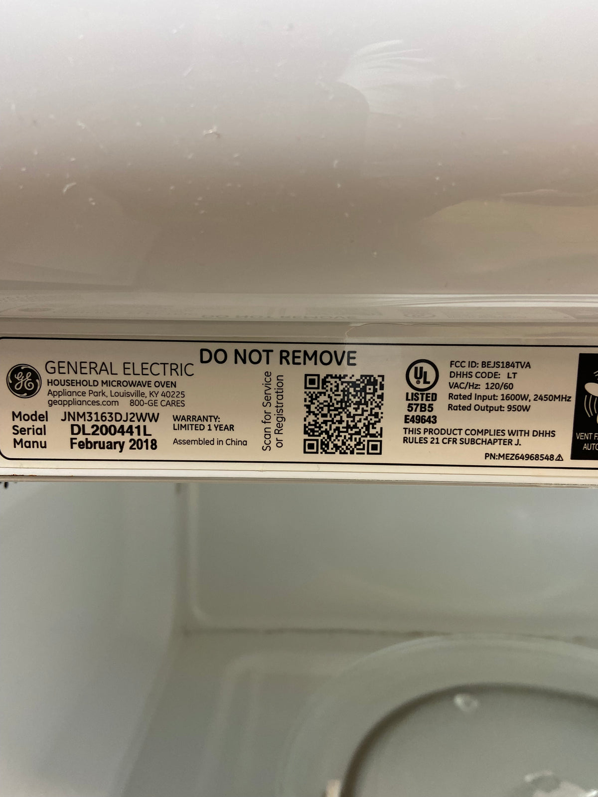 White GE Over The Range Microwave