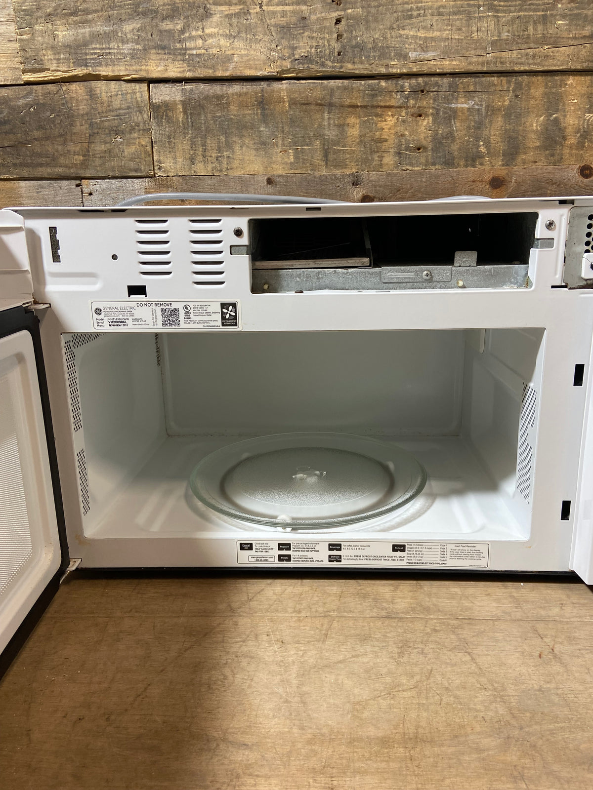 White GE Over The Range Microwave