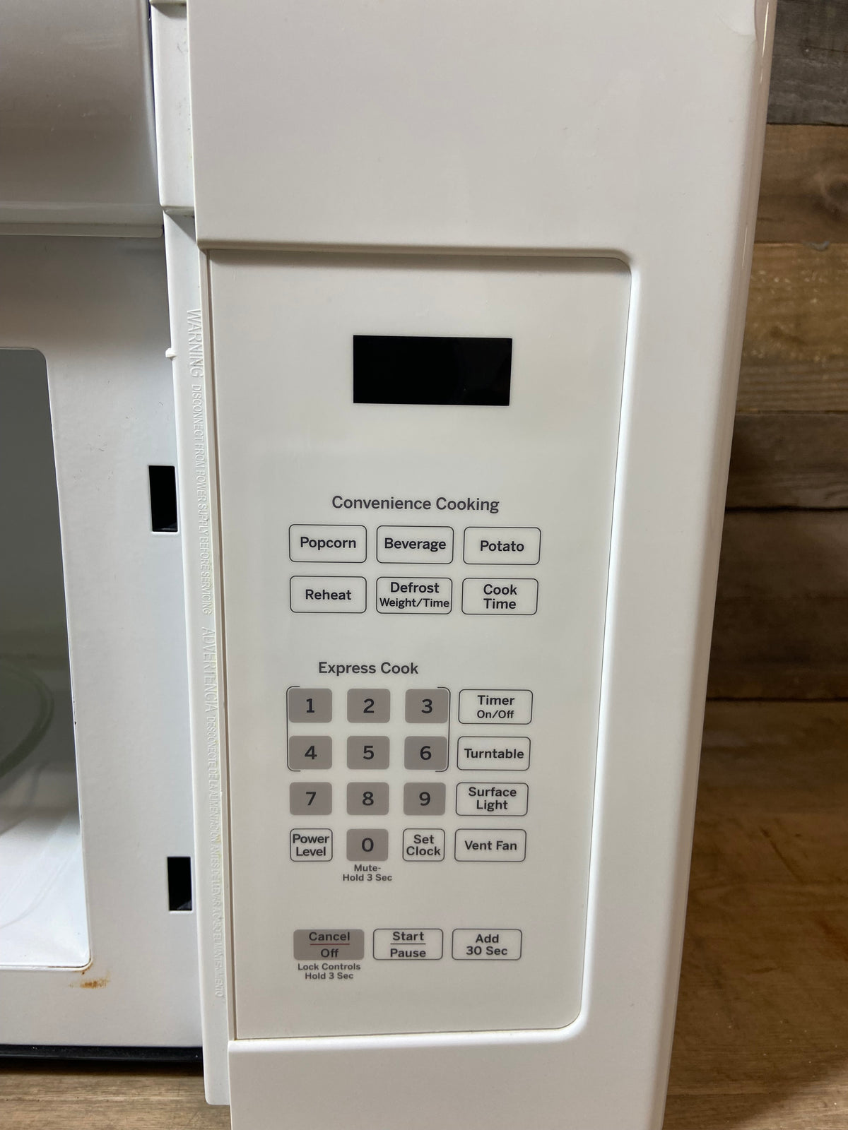 White GE Over The Range Microwave