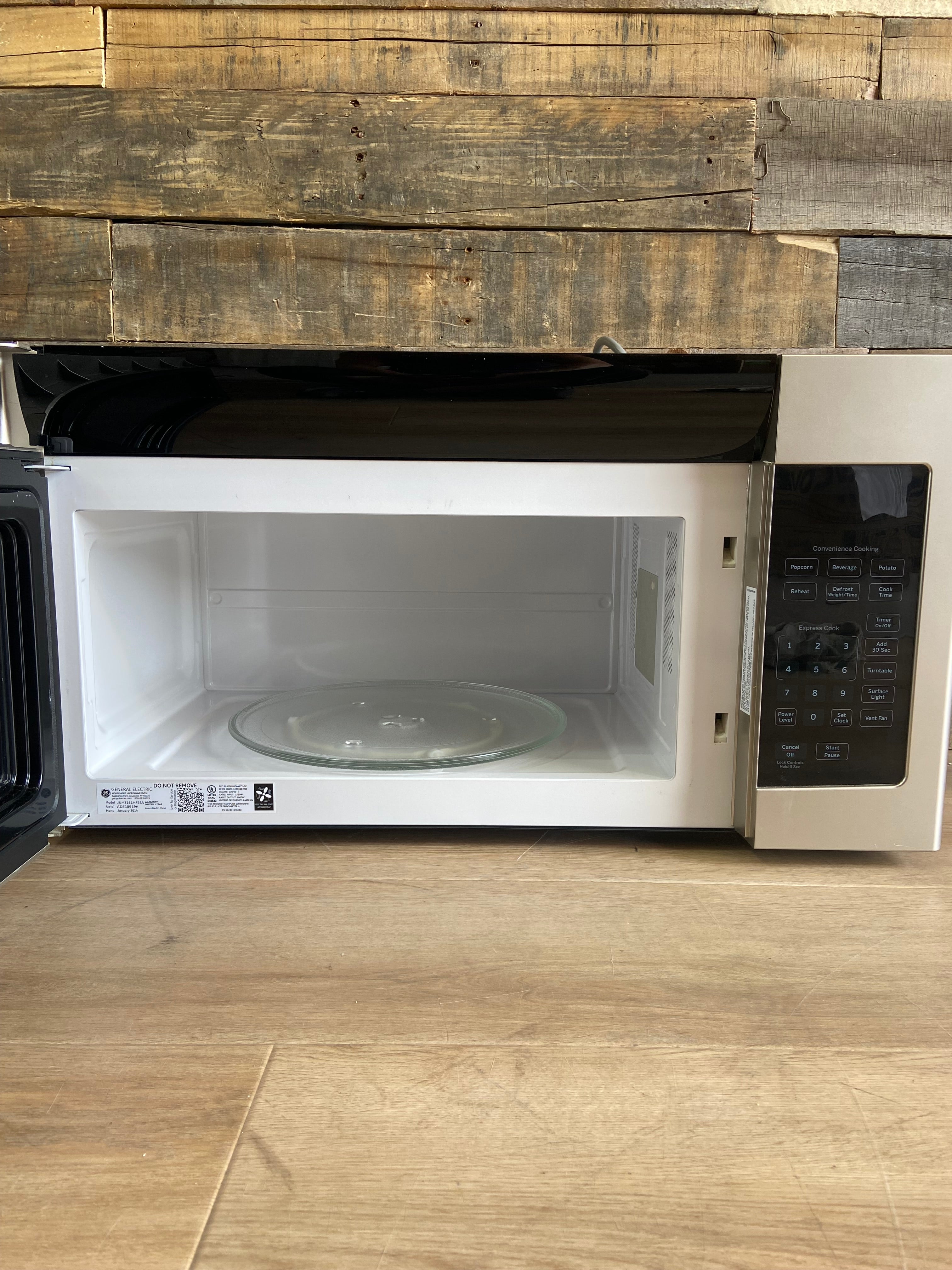 Stainless GE® 1.6 Cu. Ft. Over-the-Range Microwave Oven with Recirculating Venting
