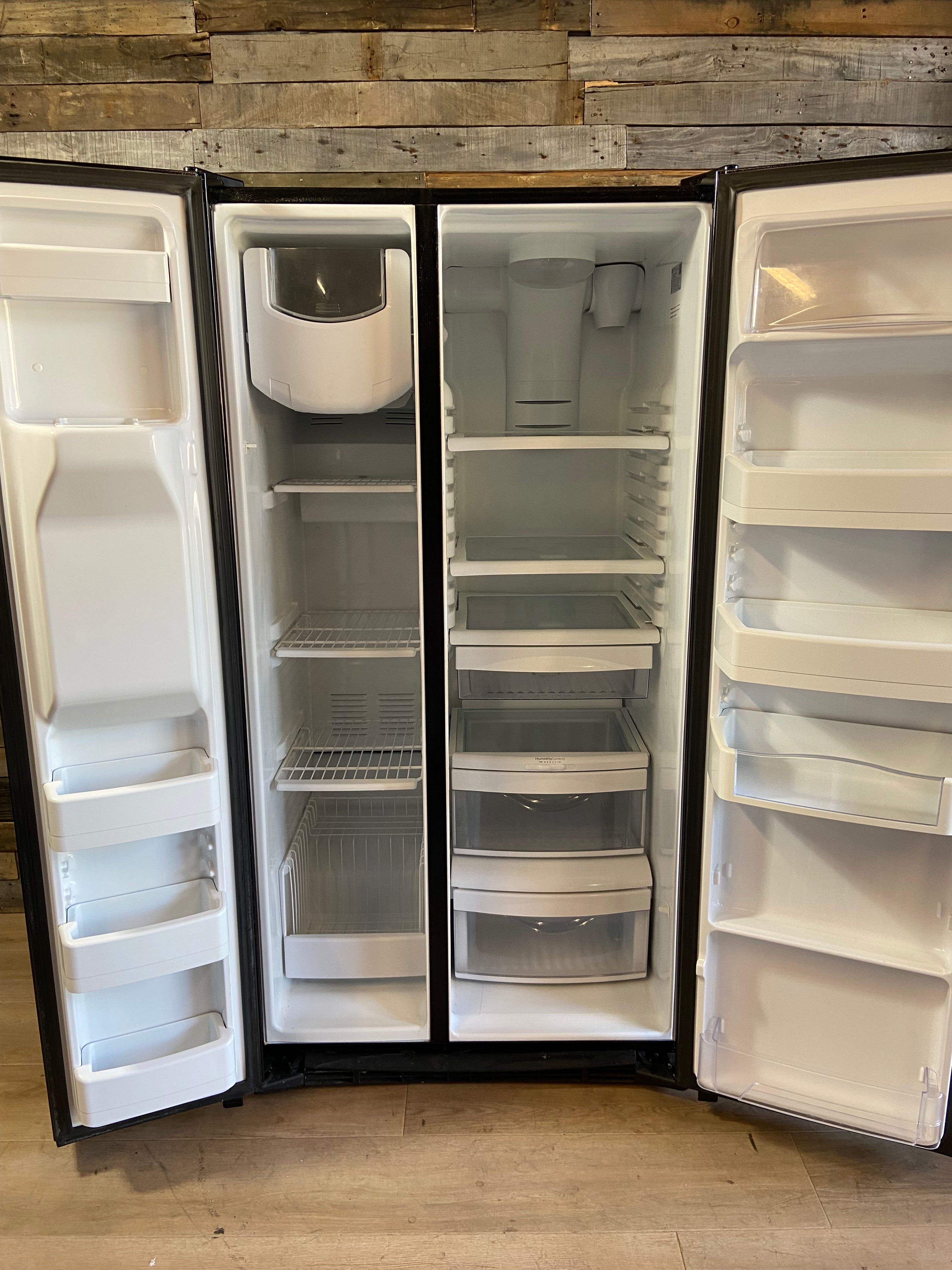 Black Side/Side GE Refrigerator. Ice/Water doesn’t work