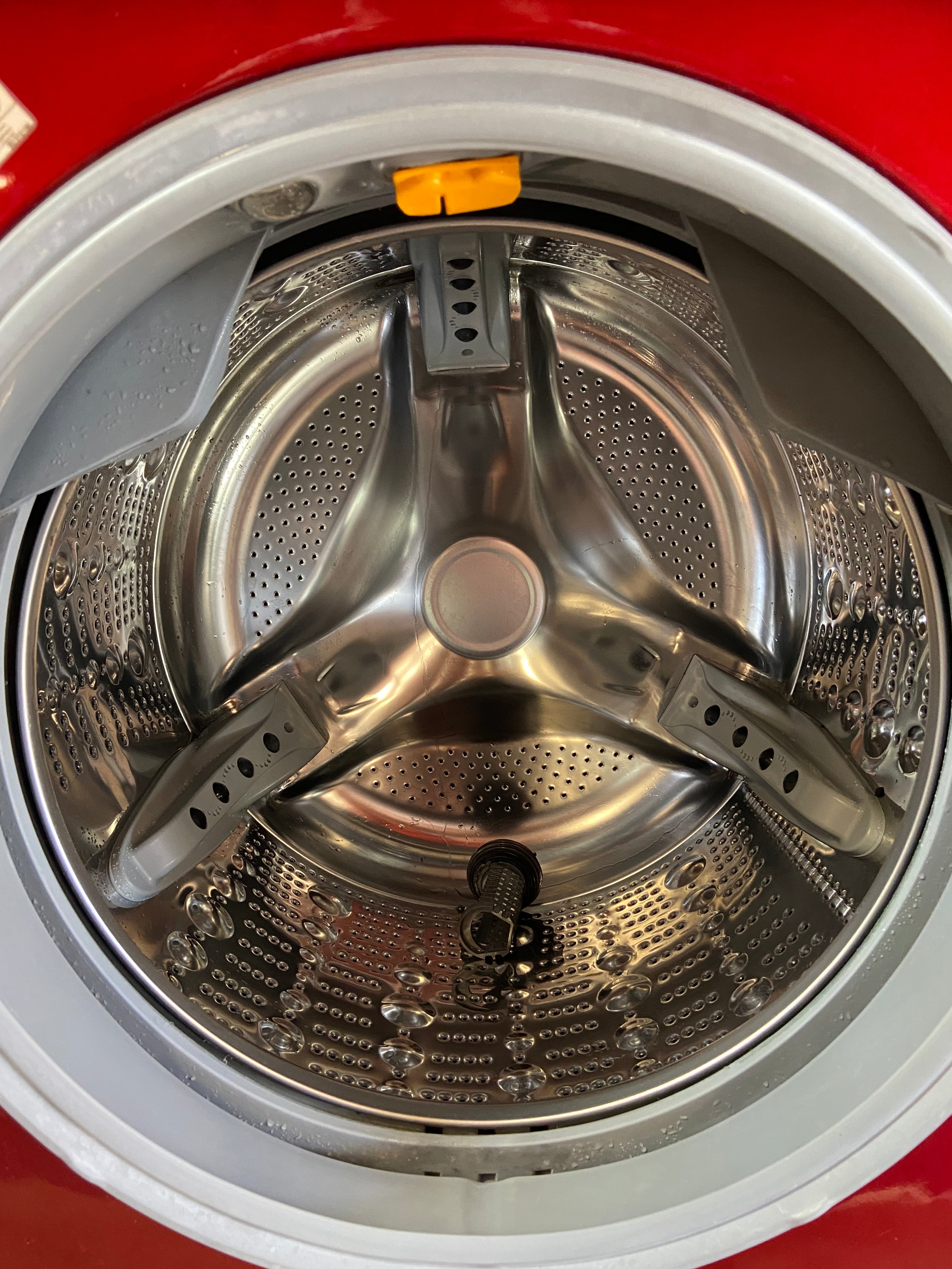 Red LG Front Load Washer & Dryer Set With Pedestals